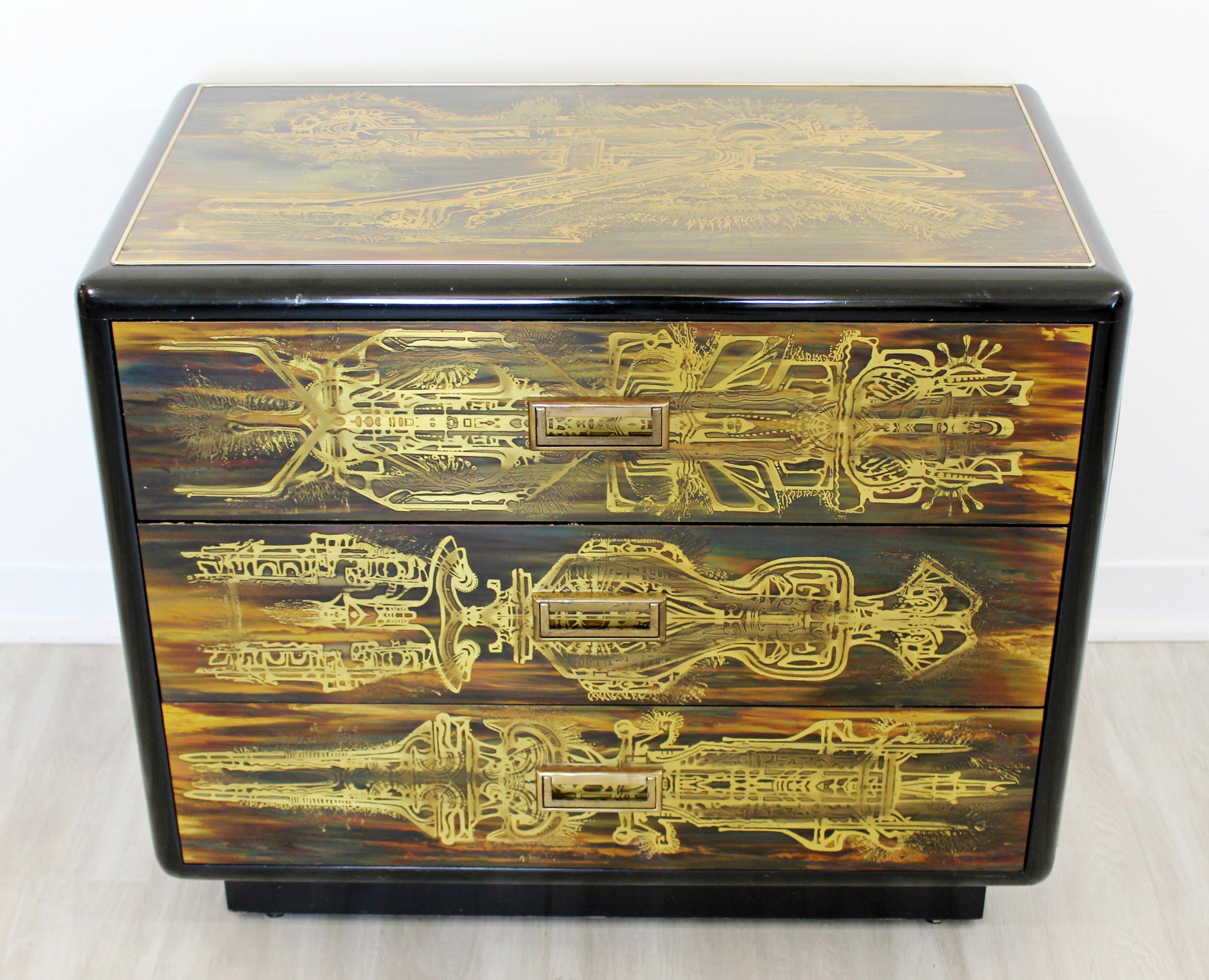 For your consideration is a phenomenal, acid etched chest or cabinet of black lacquer drawers, with a chinoiserie design, by Bernard Rohne for Mastercraft, circa the early 1970s. In excellent vintage condition. The dimensions are 31