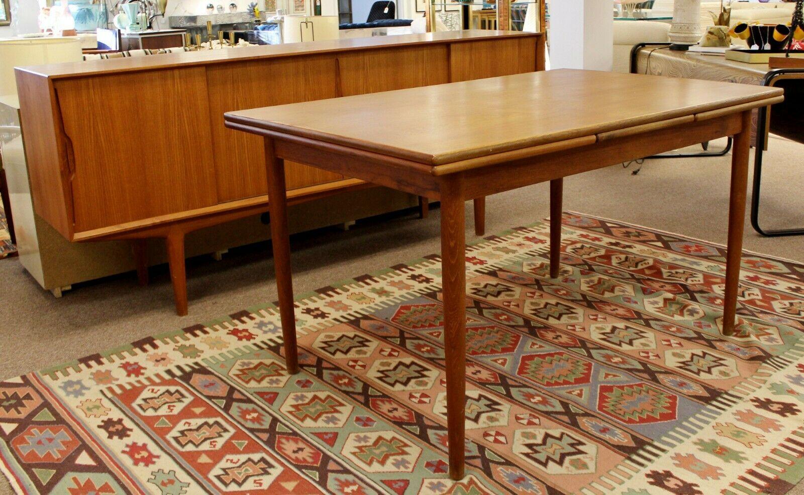For your consideration is a wonderful, rectangular dining table, with two self containing leaves, designed by Bernhard Pedersen for Vejen Bordfabrik, circa 1950s. In excellent vintage condition. The dimensions are 51