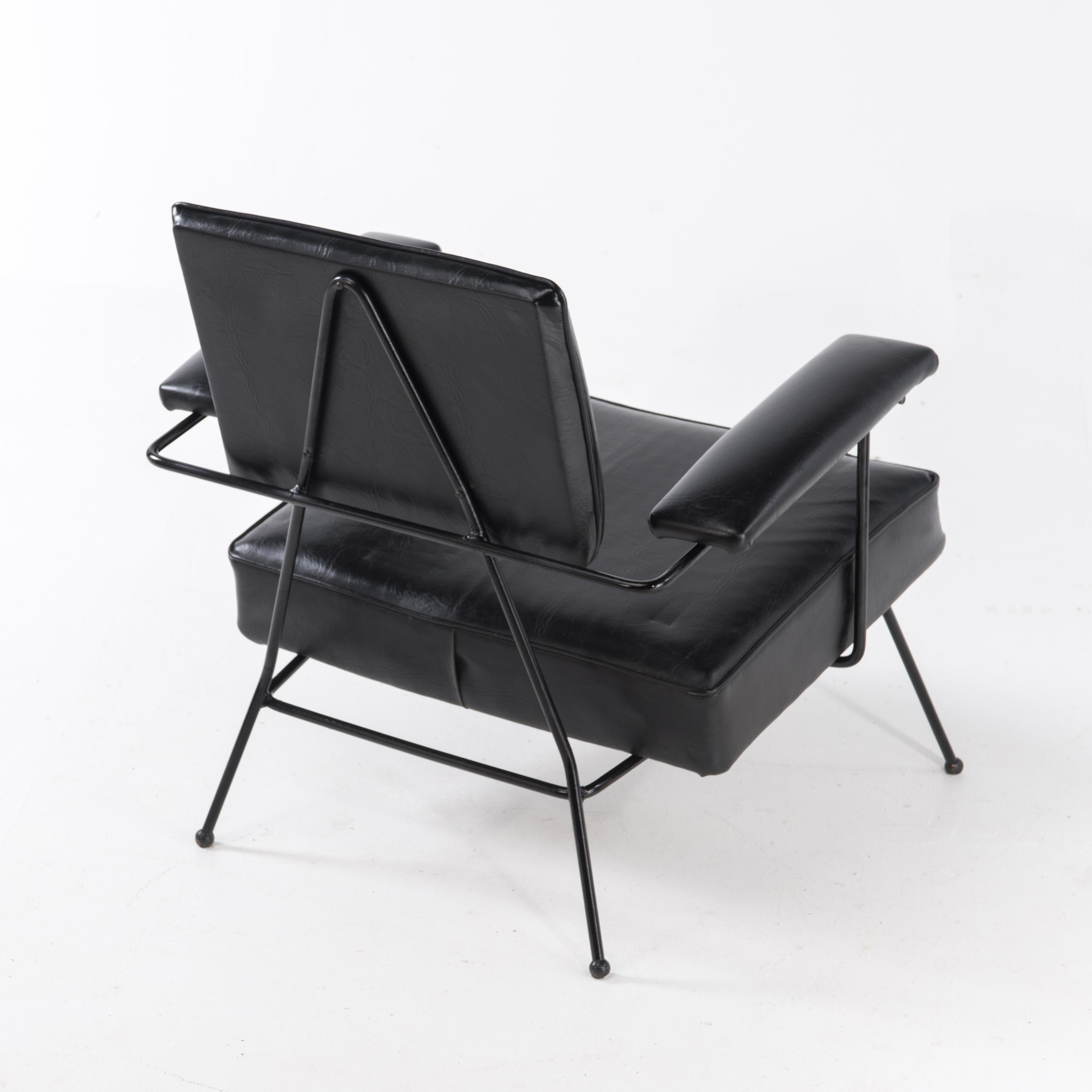 A stunning, rare and super comfortable Adrian Pearsall for Craft Associates armchair in original black vinyl. Signed.