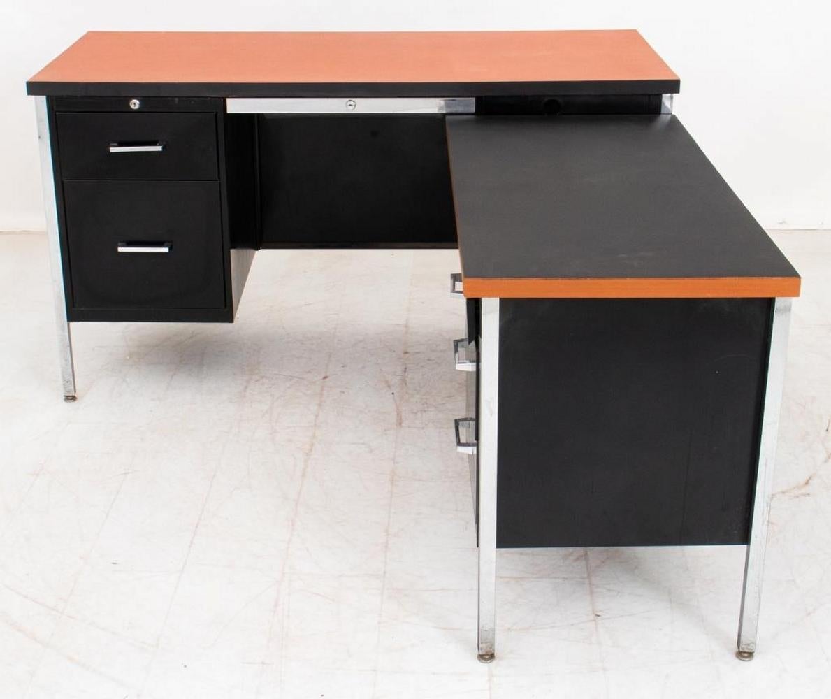 Mid-Century Modern Black Aluminum and Chrome L-Shaped Desk, with painted wood top, two short drawers above two right side drawers and three left side drawers, with 