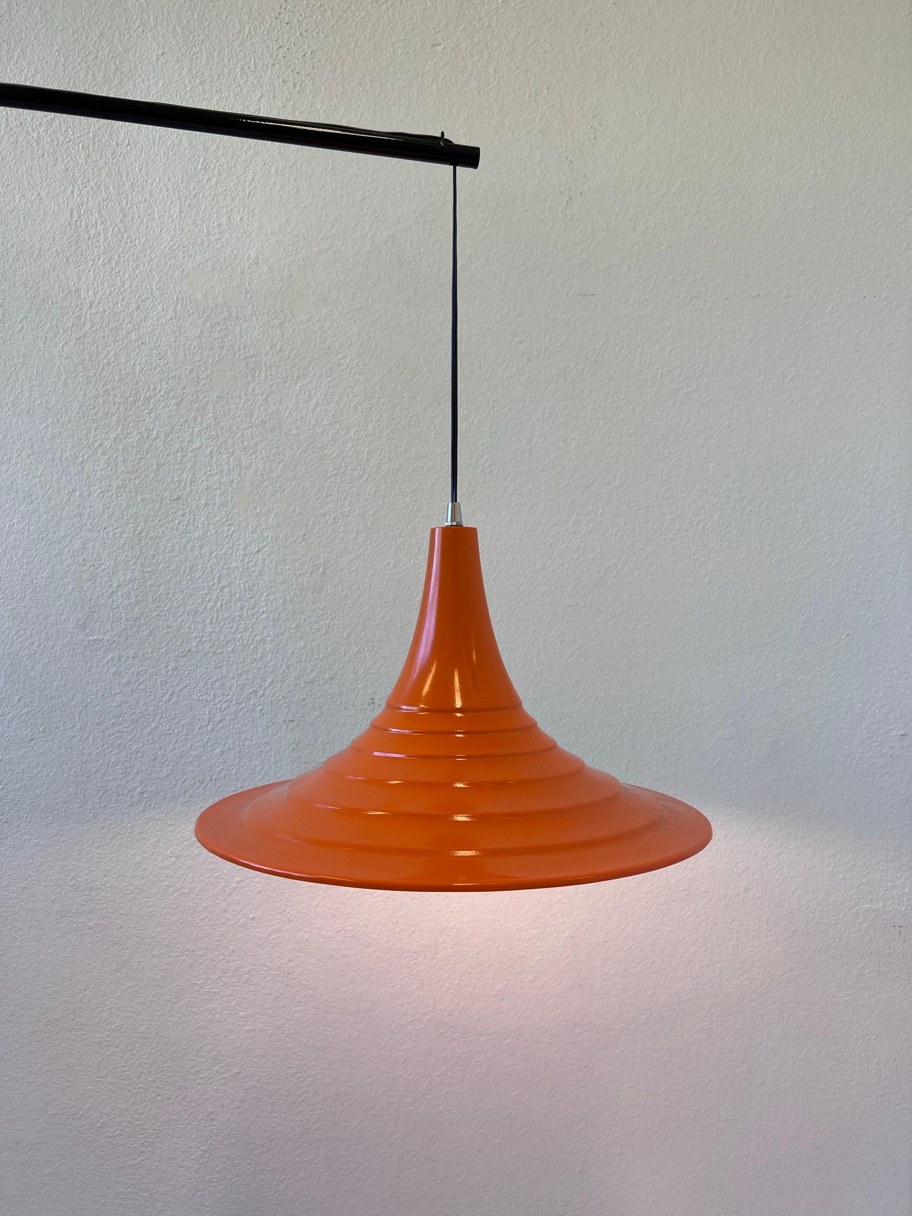 Mid-Century Modern Black and Orange Iron Tripod Floor Lamp  In Good Condition For Sale In Palm Springs, CA