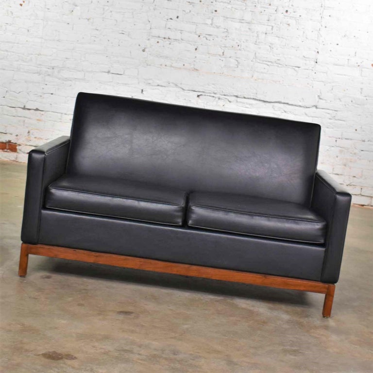 American Mid-Century Modern Black Faux Leather Love Seat Sofa by Taylor Chair Co. Style D For Sale