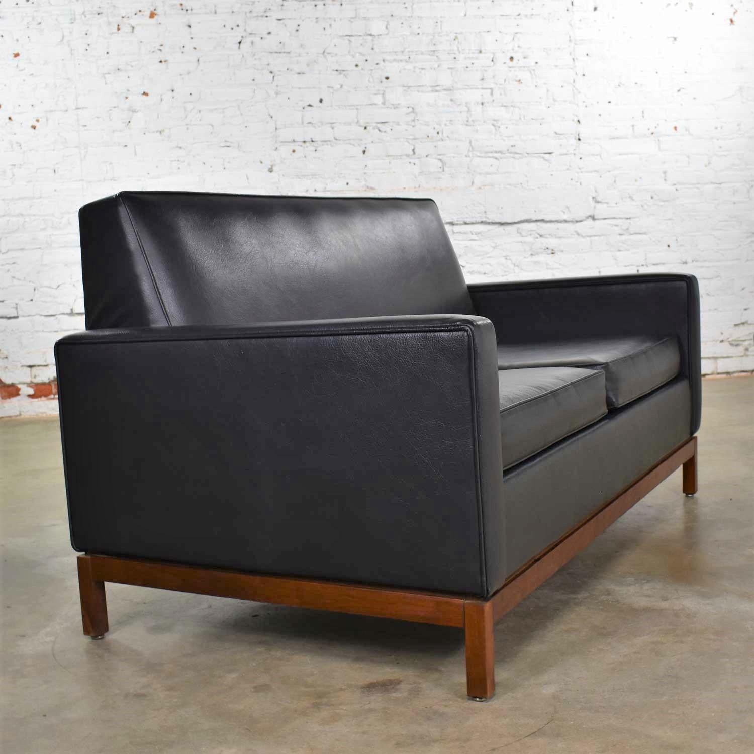 Mid-Century Modern Black Faux Leather Love Seat Sofa by Taylor Chair Co. Style D In Good Condition For Sale In Topeka, KS