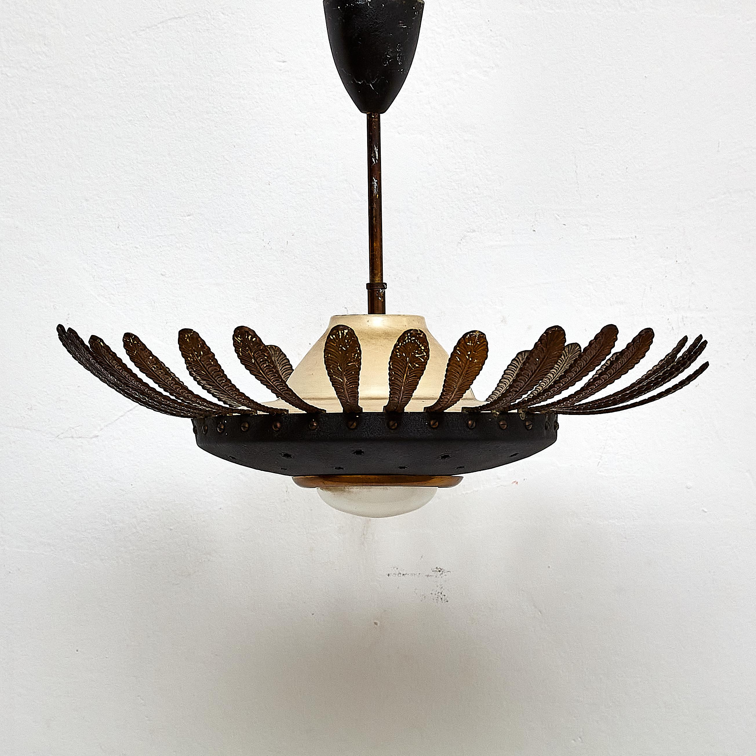 Mid-Century Modern black flower ceiling lamp.

Manufactured France, circa 1960.

Dimensions: 
Diam. 48 x H 35 cm

In original condition, with minor wear consistent with age and use, preserving a beautiful patina.

Important information