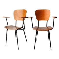 Paire de fauteuils en teck et fer noir de style moderne du milieu du siècle dernier, France, 1950
