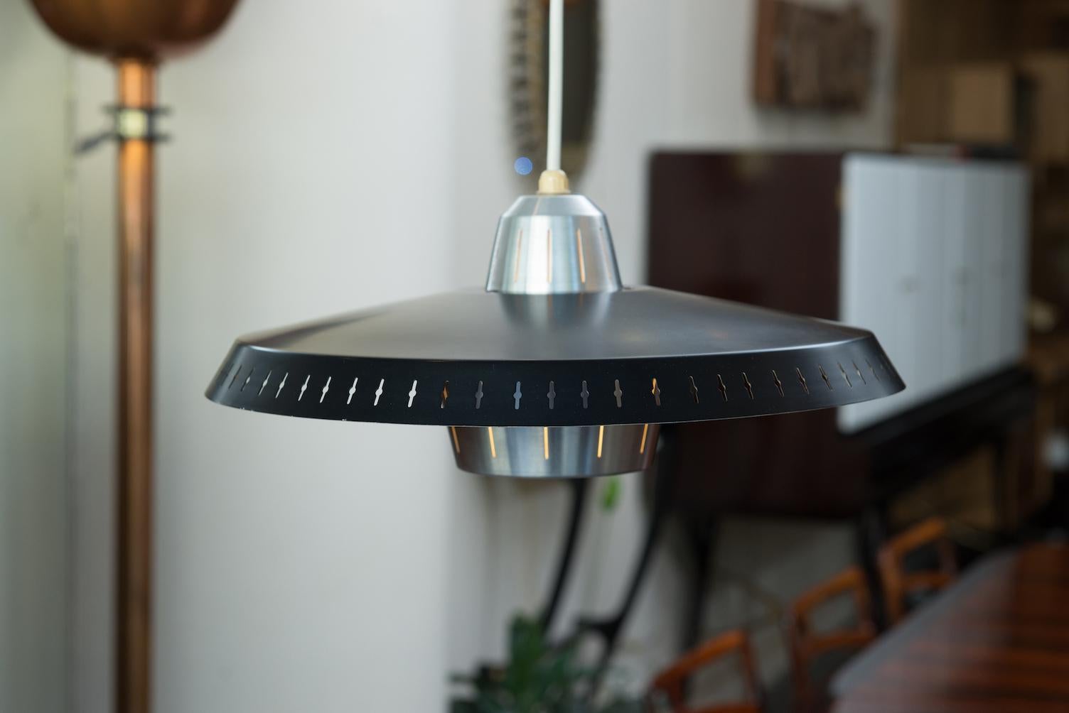 Black lacquered and brushed aluminium Mid-Century Modern pendant.