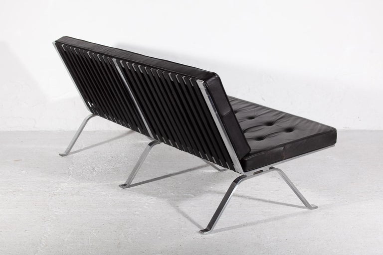 Stainless Steel Mid-Century Modern Black Leather and Chrome Sofa Designed by Hans Eichenberger  For Sale