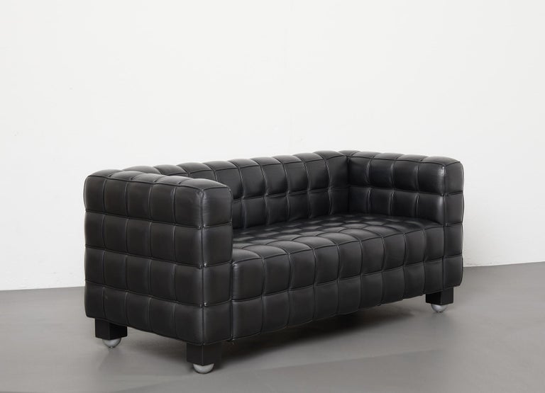 The iconic Kubus sofa has been designed by Josef Hoffmann in 1910 and produced by Wittmann, Austria around 1980.
 
The shape of the cube is the central element of this emblematic sofa which is characterized by strict geometric lines reminiscent of