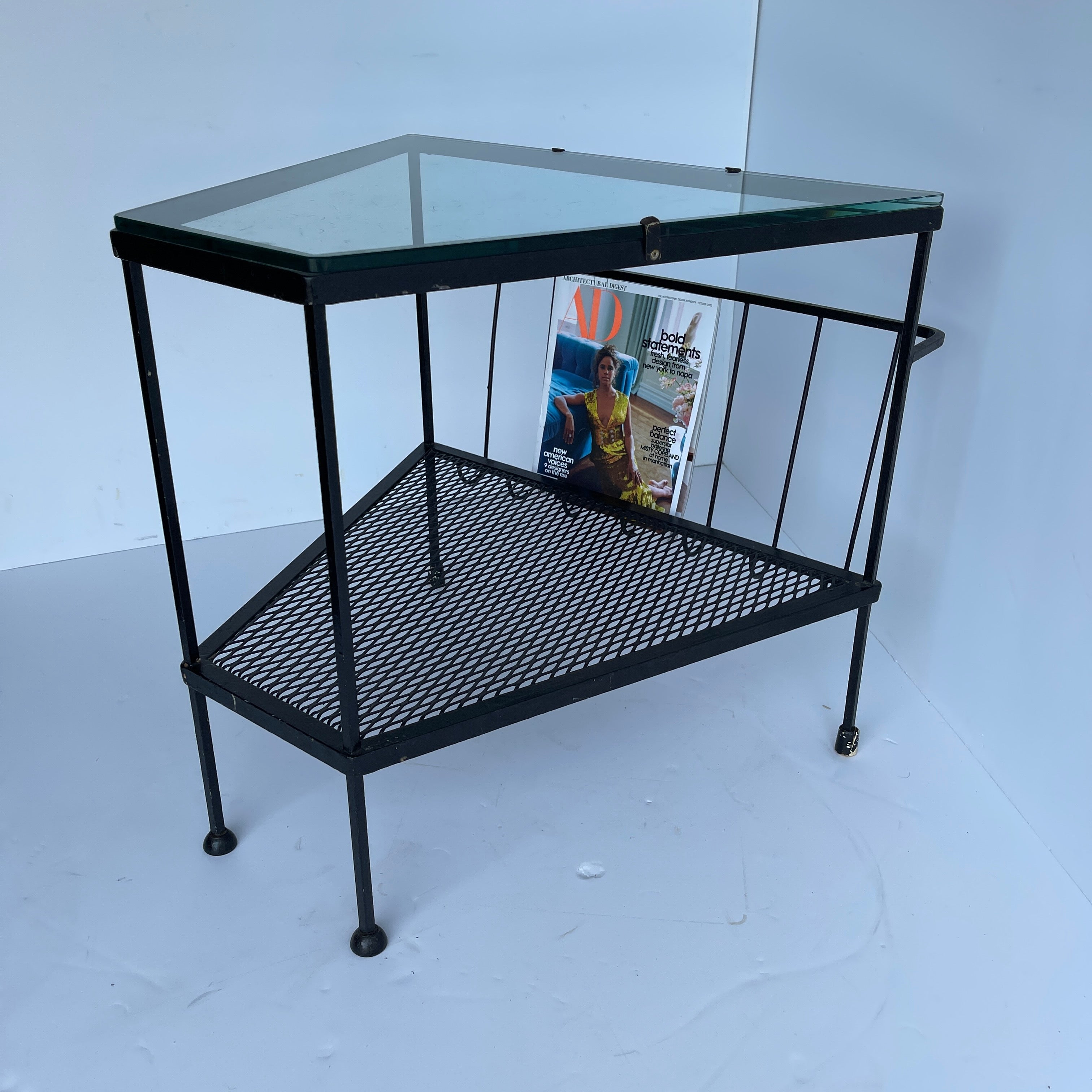 black magazine rack table