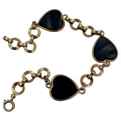 Bracciale a cuore in onice nero moderno di metà secolo in oro 14 carati Retro