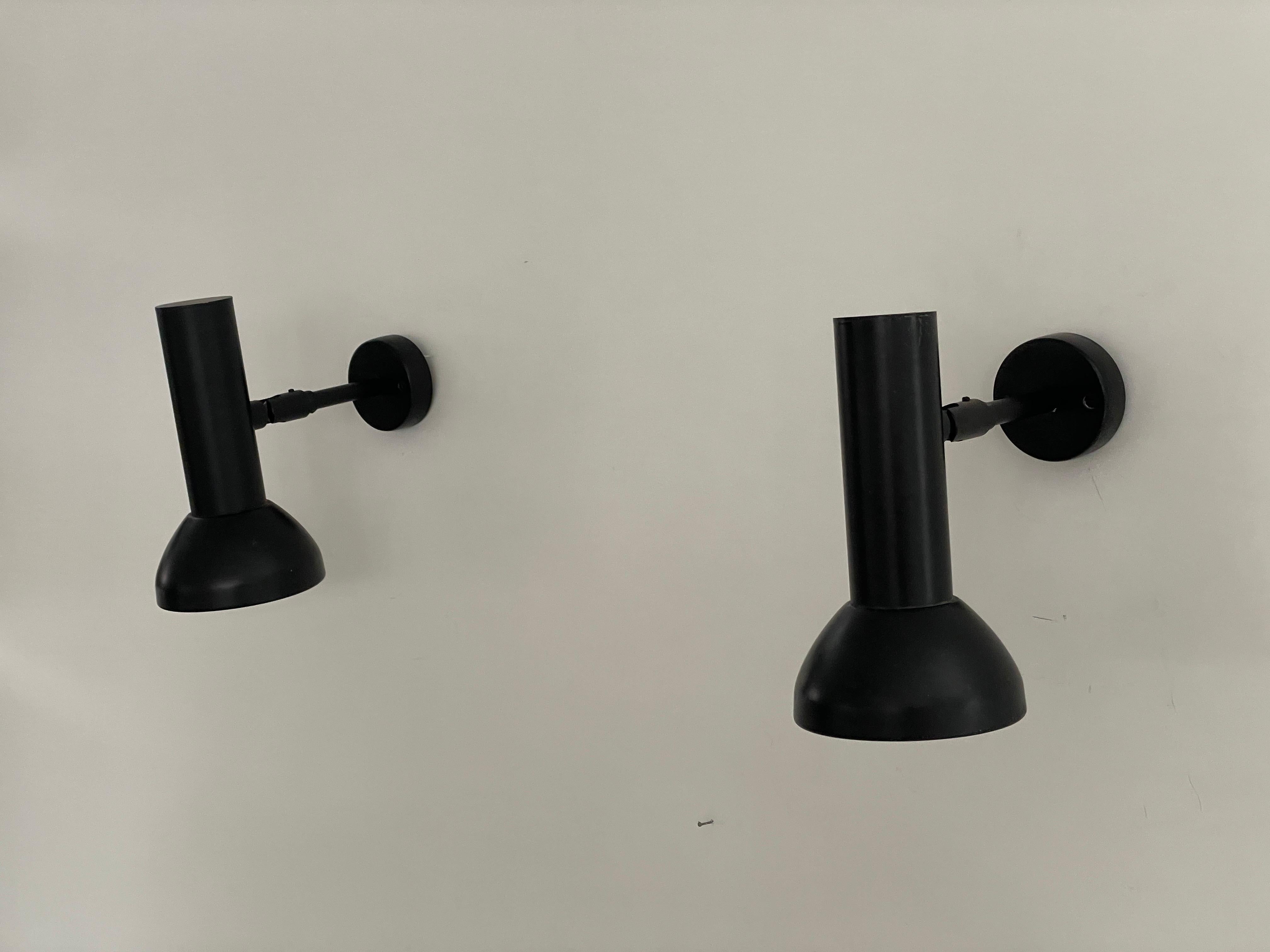 Mid-century Modern Black Pair of Sconces by Cosack Leuchten, 1960s, Germany

Very elegant and Minimalist  Black wall lamps
Lamp is in very good condition.

These lamps works with E14 standard light bulbs. 
Wired and suitable to use in all countries.