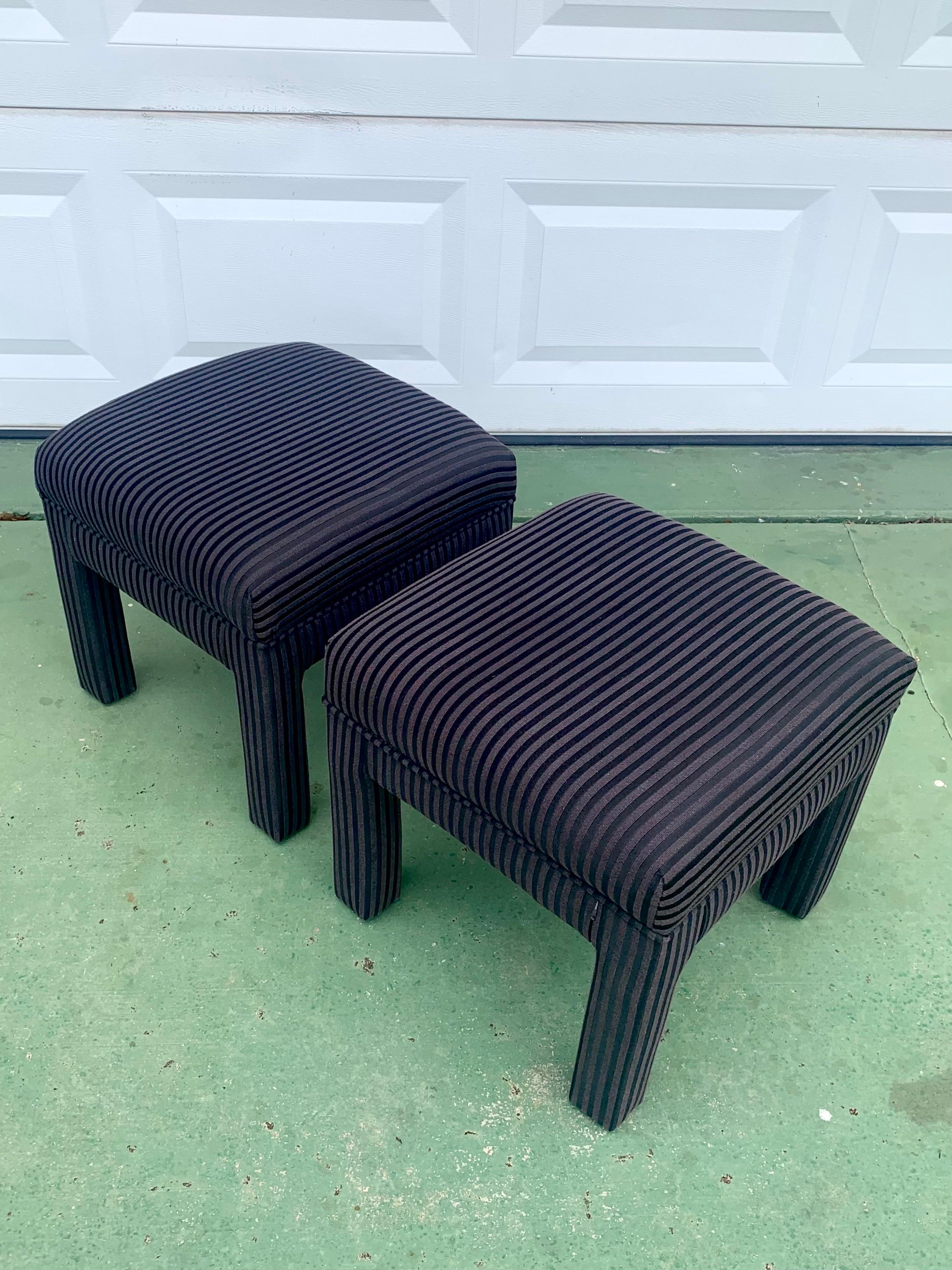 Pair of vintage Parsons style stools. Upholstery and structure remain in great condition. Upholstery is a striking mix of black and grey stripes. One single instance of separation in the upholstery. Otherwise I’m great vintage condition. 

They