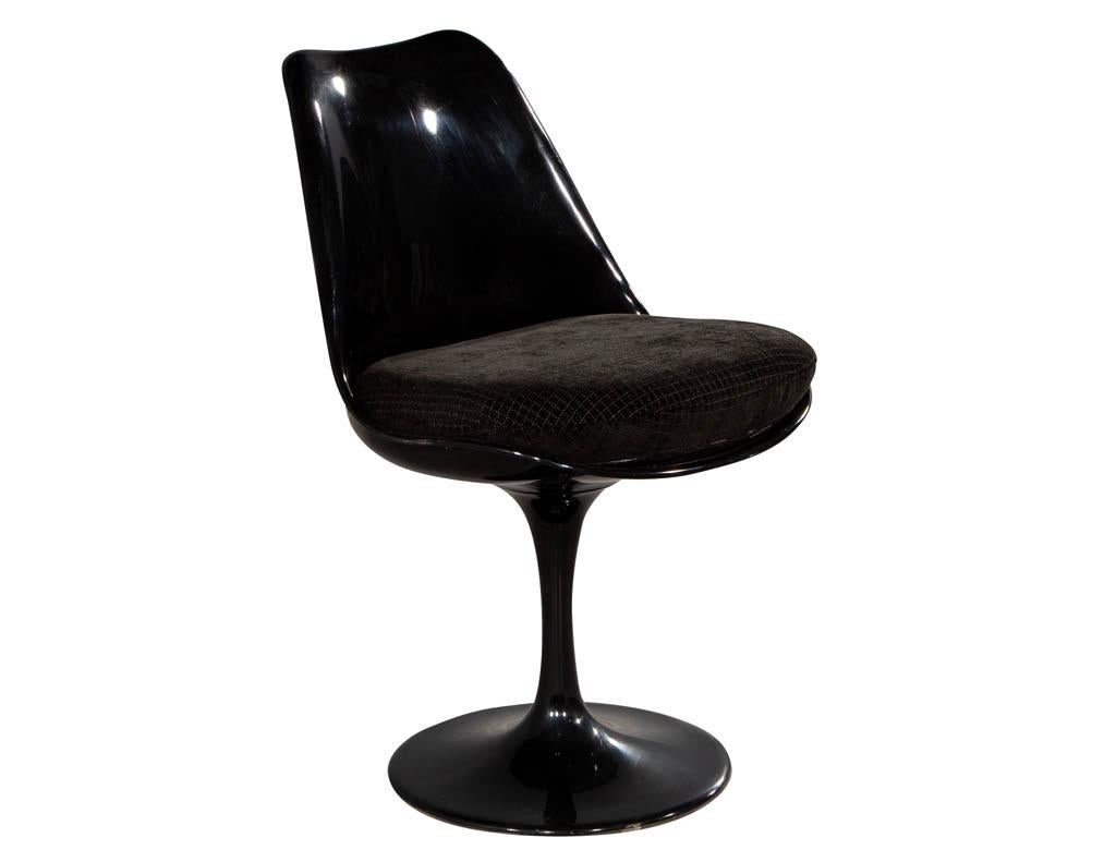 Mid-Century Modern black tulip chair. Featuring original acrylic design with newly upholstered black fabric.

Price includes complimentary scheduled curb side delivery service to the continental USA.