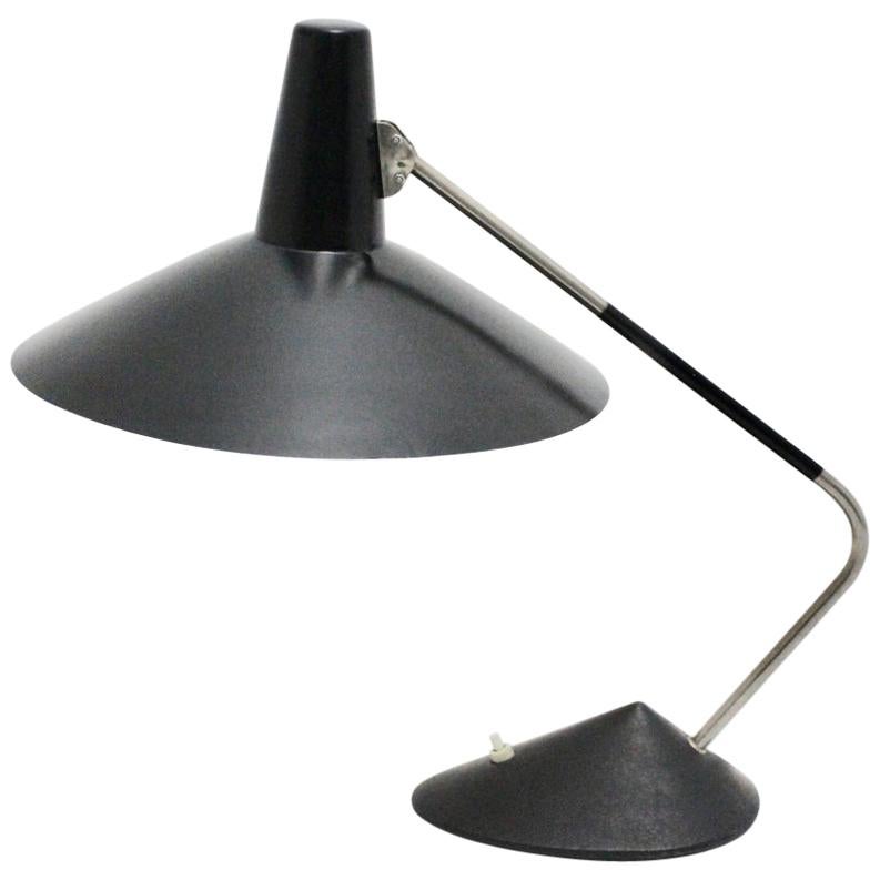Lampada da tavolo moderna di metà secolo in metallo nero vintage di Stilnovo, 1950, Italia