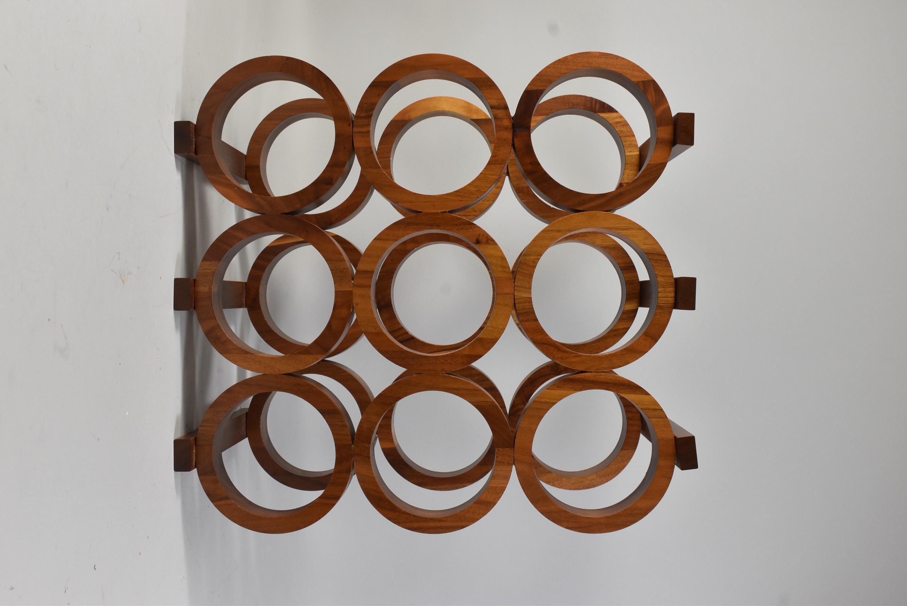Mid-Century Modern black walnut nine bottle wine rack by Kustom Kraft. Measures: 16