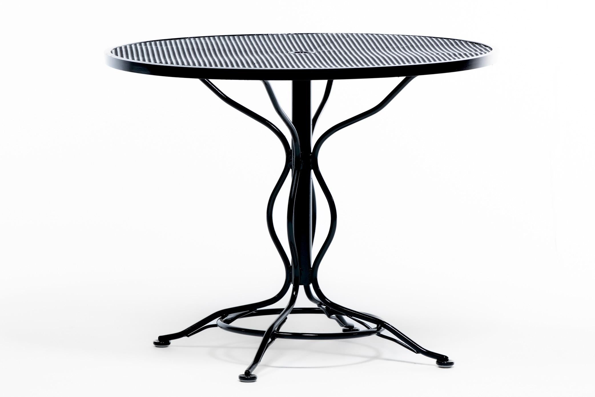 Milieu du XXe siècle Table en fer forgé noir de style The Moderns avec base et repose-pieds sculpturaux en vente