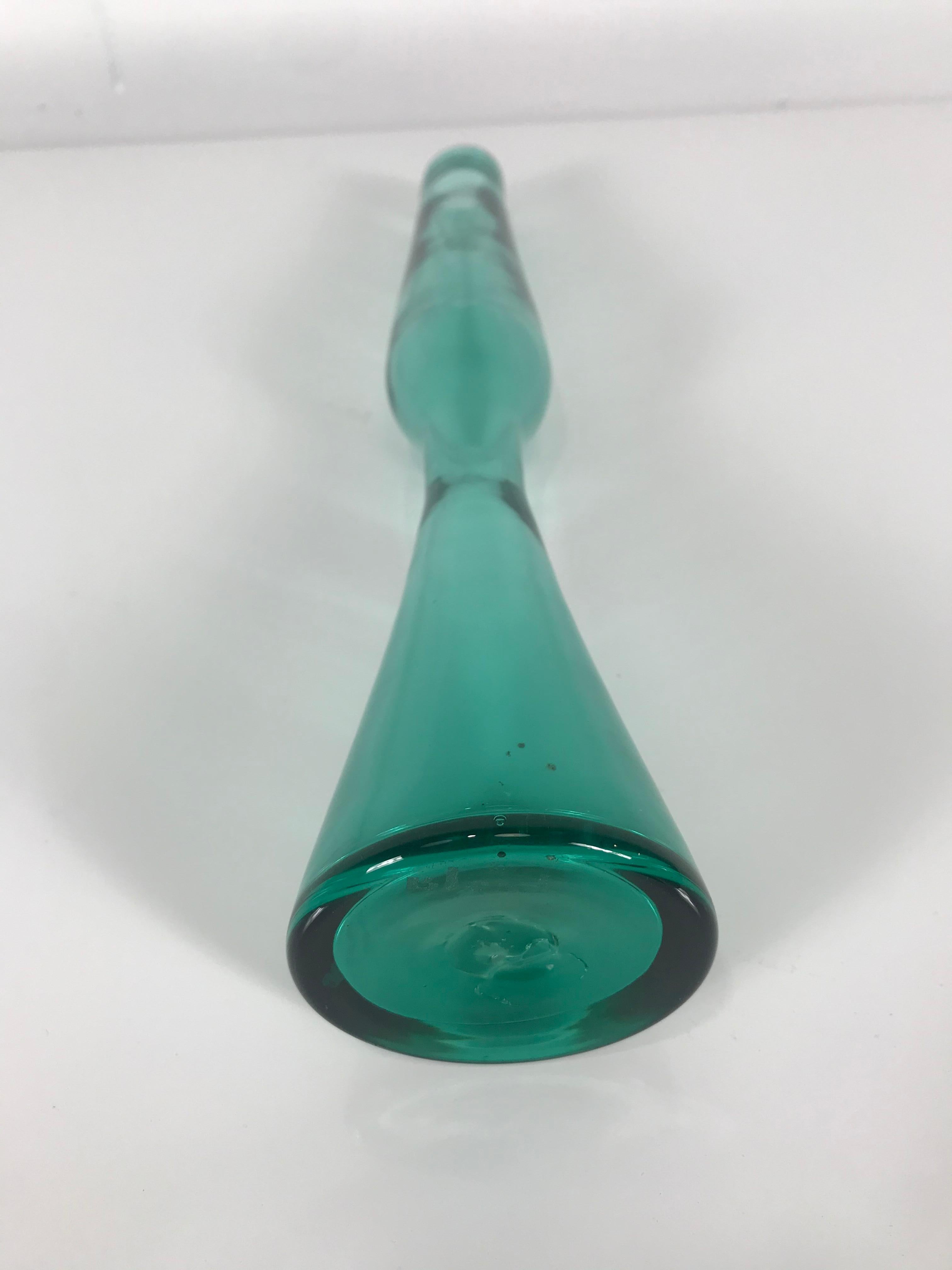 This is the taller of the scarce vase number 6024, also known as the Rocket vase, designed by Wayne Husted in the lovely teal green color that Blenko called 