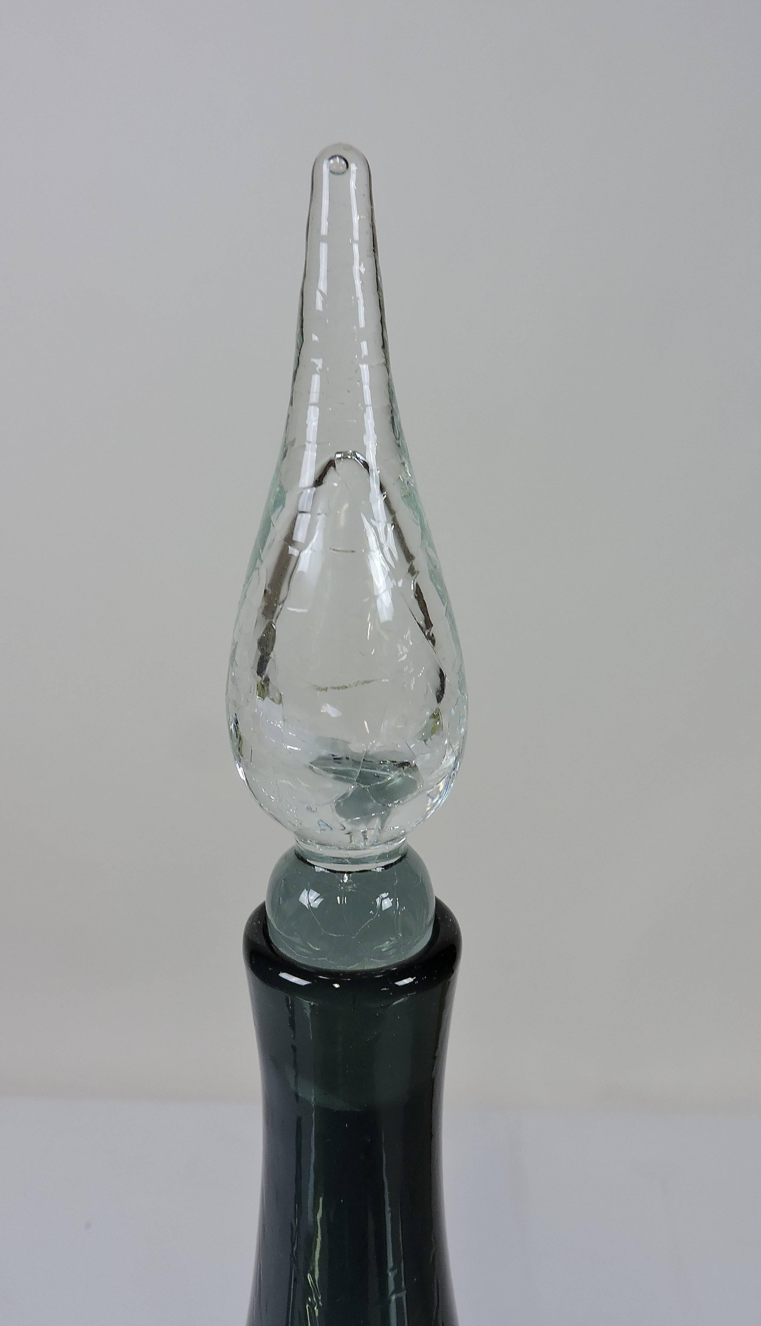 Beautiful handblown charcoal color crackle glass decanter with a clear stopper. Designed by Winslow Andersen and manufactured by Blenko Glass in W. Virginia in the 1950s.