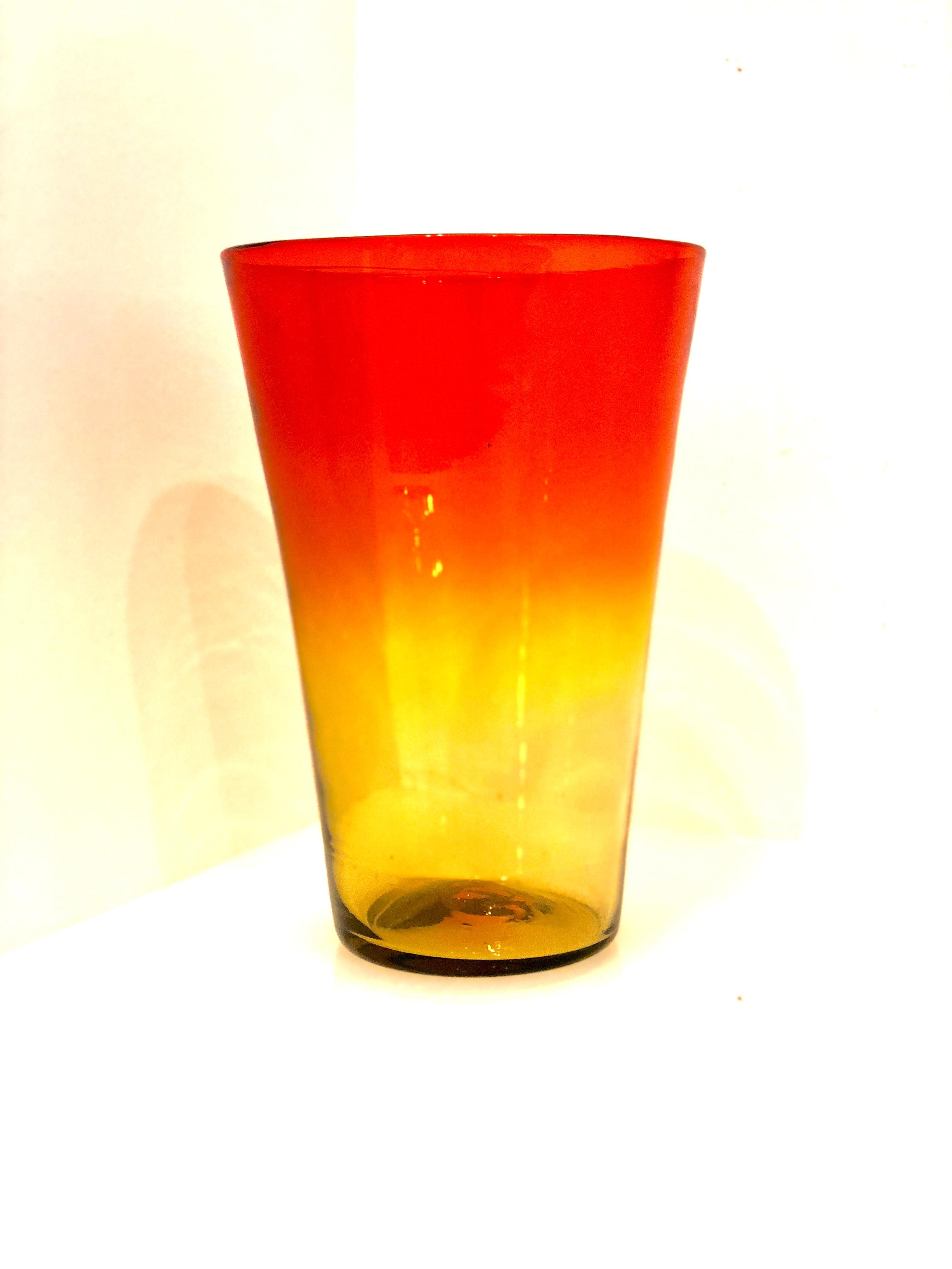 Beautiful mouth blown Blenko glass flower vase, in very collectible amberina glass.