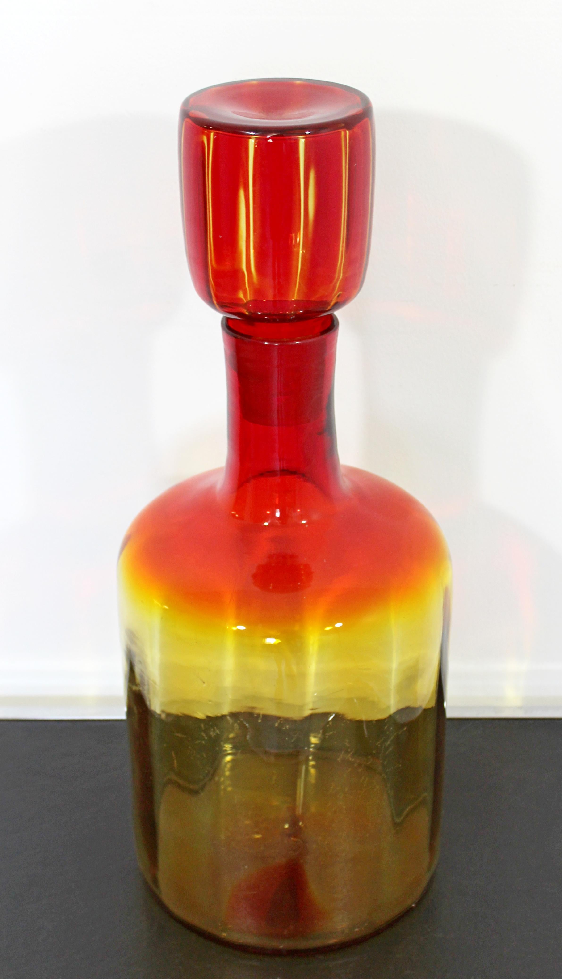 For your consideration is a rare and large oversized red orange Blenko glass decanter with stopper, by Joel Myers, made in Italy, circa 1960s. In excellent condition. The dimensions are 9
