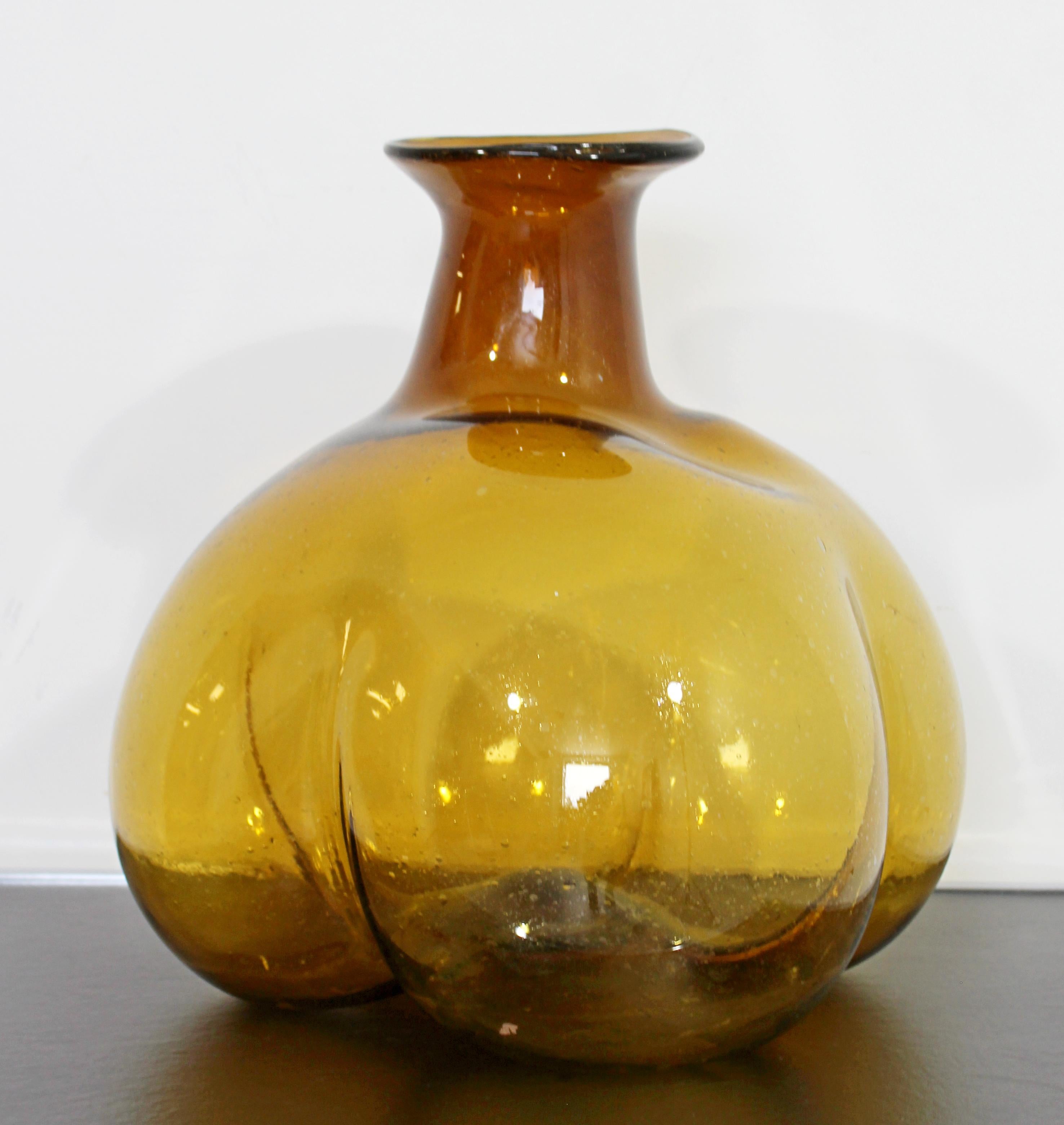 For your consideration is a stunning, large, orange, blown glass vessel vase table sculpture, signed by the artist, circa 1970s. In excellent condition. The dimensions are 12