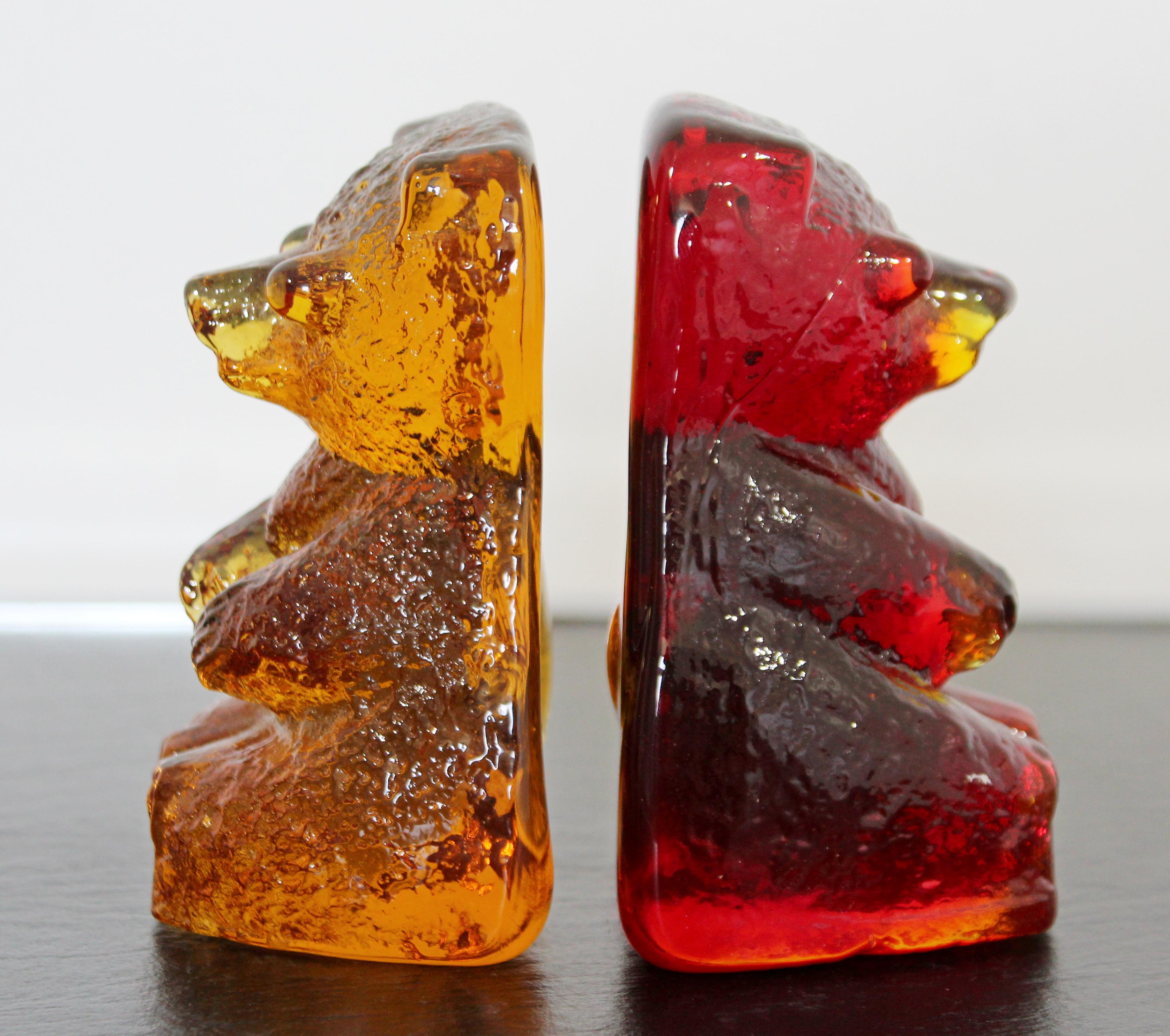 For your consideration is a fun pair of book ends, in the shape of a bears, made of yellow and red Blenko glass, circa 1970s. In excellent condition. The dimensions of each are 3.5