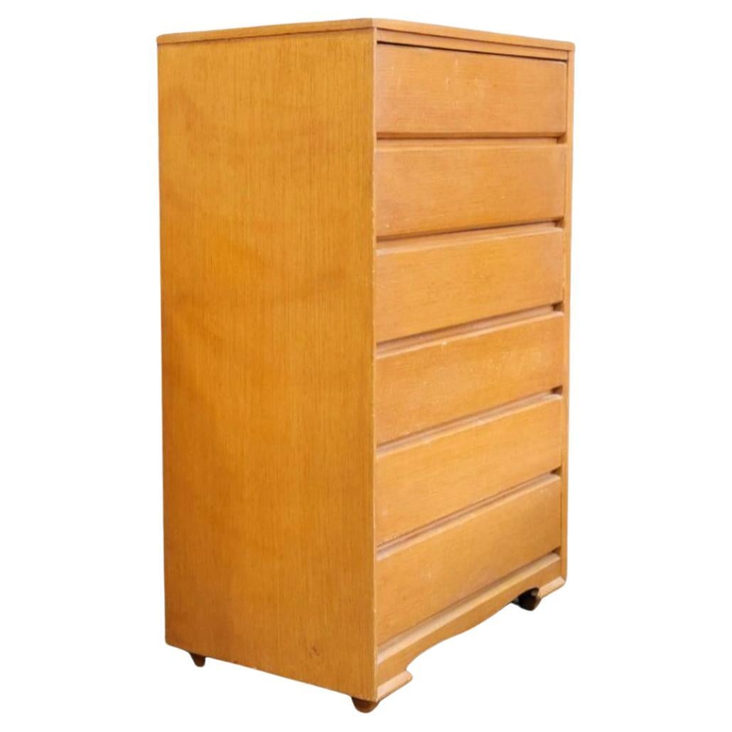 Mid-Century Modern tall 6 drawer maple blonde dresser. Simple design and narrow High Chest. Good Vintage condition. All solid wood Circa 1950s with Curved leg design. Made In USA. Located in Brooklyn NYC. 

Measures 48