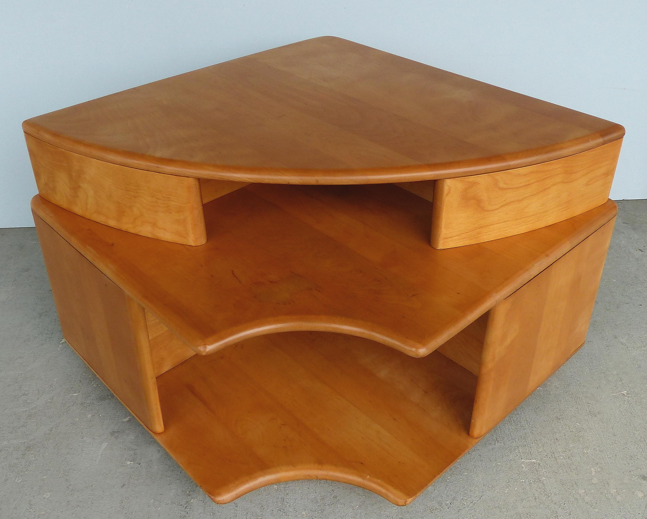 Mid-Century Modern Blonde Wood Corner Table

Offered for sale is a Mid-Century Modern blonde wood corner table. This unusual table has several tiers that would be great to store books and magazines.