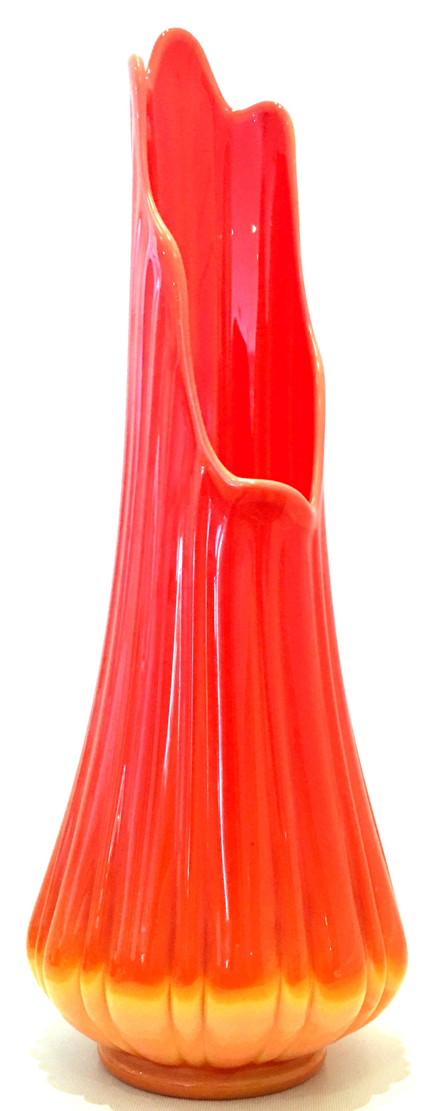 Mid-Century Modern blown glass ribbed slag glass vase. This coveted vase is vibrant orange and yellow with ribbed detail.