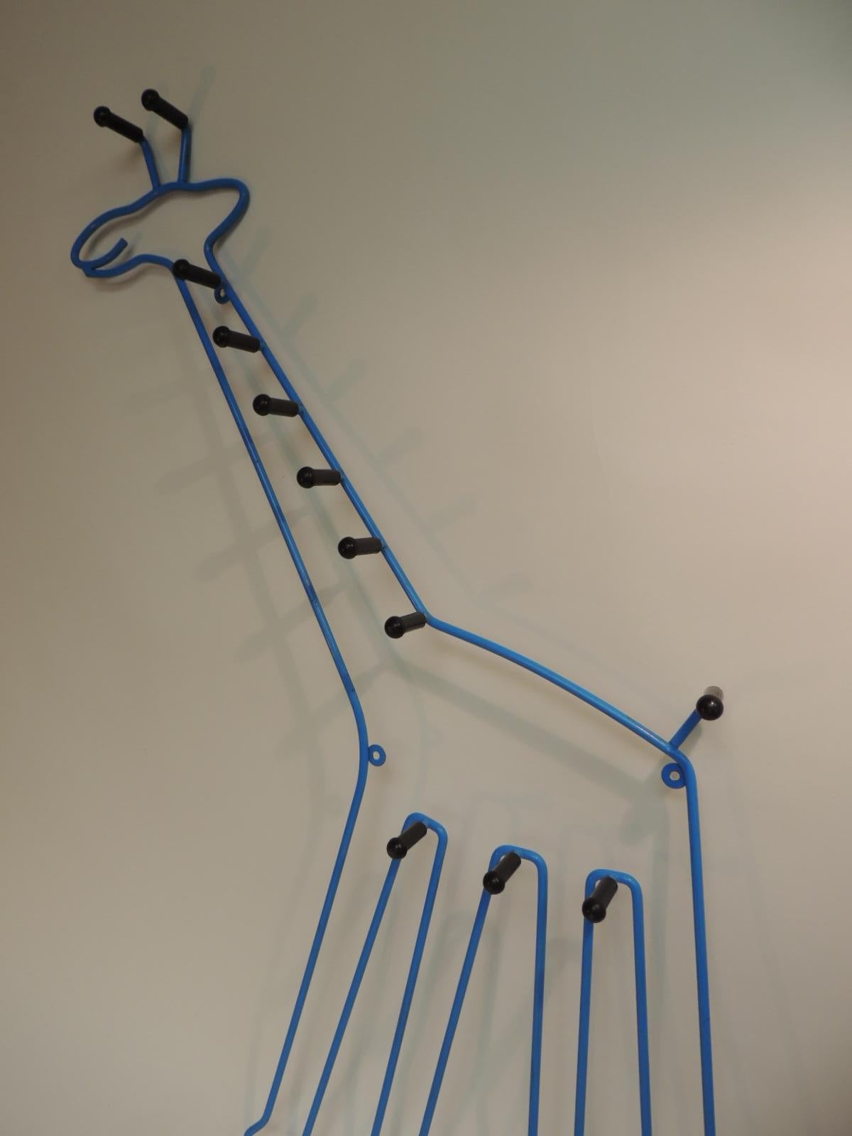 Mid-Century Modern children/kid’s tall giraffe wall coat hanger. Blue animal silhouette with black rubber hooks.
Size: 25 x 3 x 41.5 H.
 