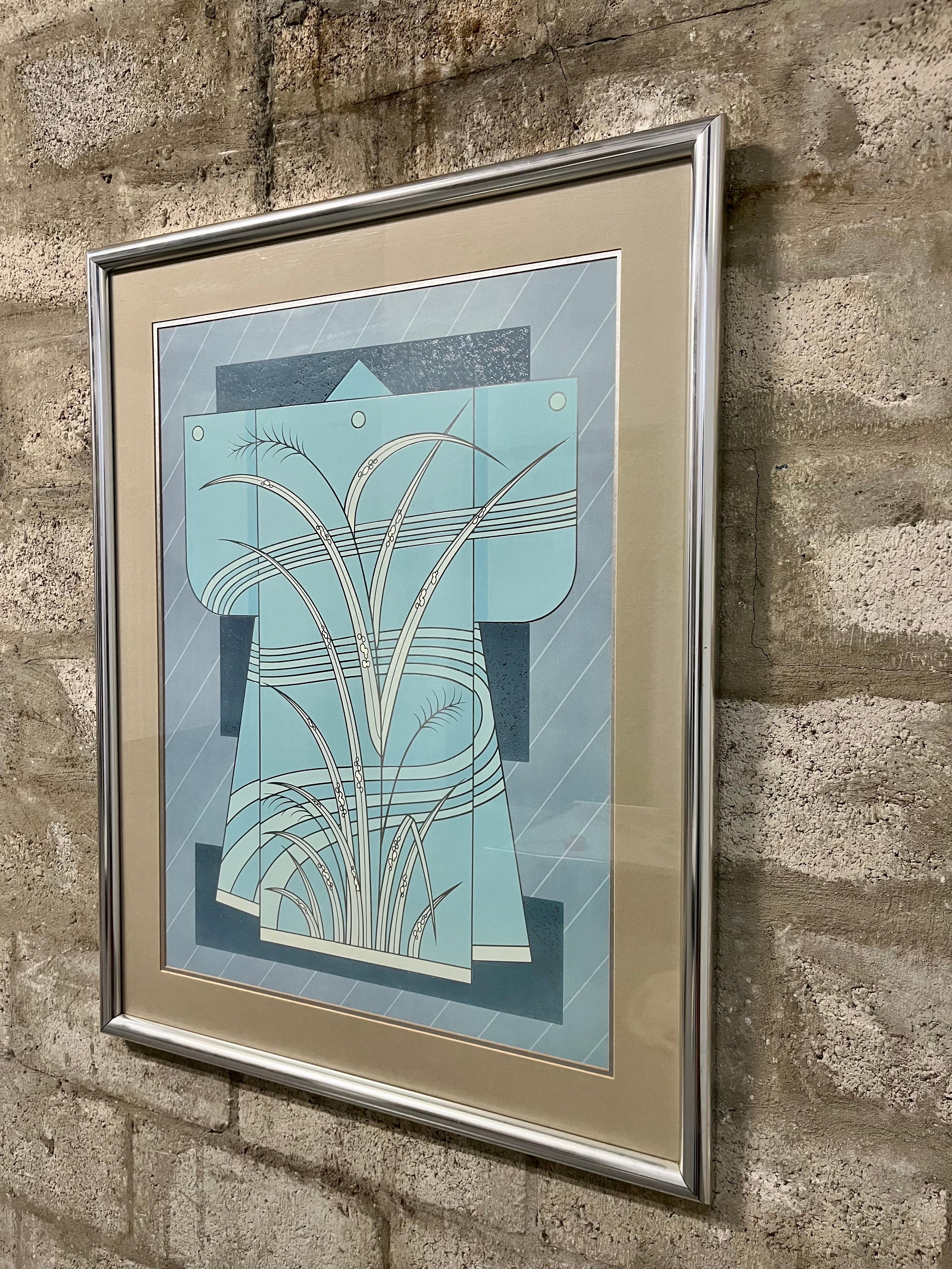 Litografia incorniciata del Mid Century Modern Blue Kimono. Circa anni '70. 
Presenta un'immagine astratta di kimono azzurro e argento su uno sfondo geometrico. Incorniciato da una cornice cromata lucida e protetto da un vetro.
In eccellenti