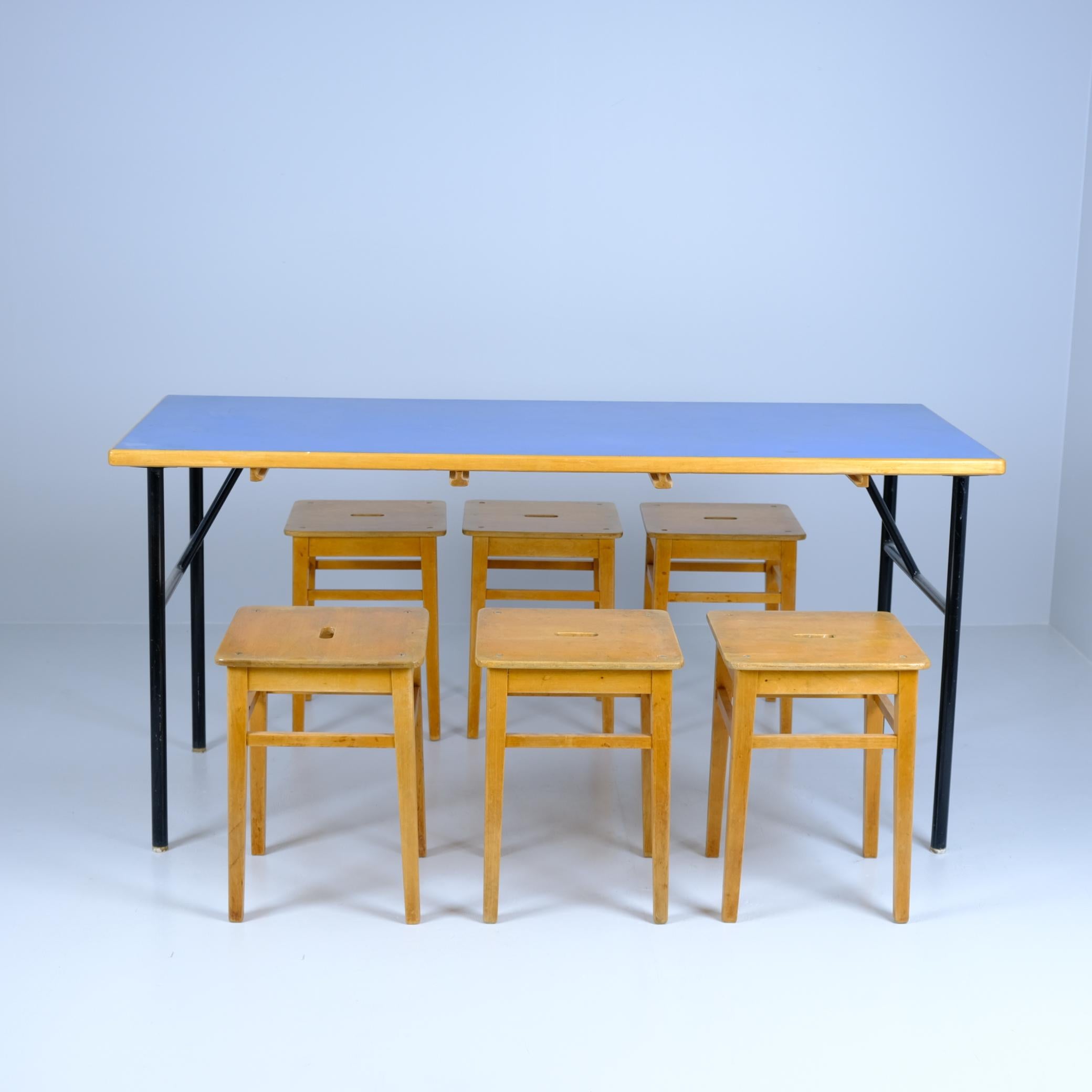 Finnish Mid-Century Modern Blue Linolium & Black Metal Table & Six Wooden Nesting Stools For Sale