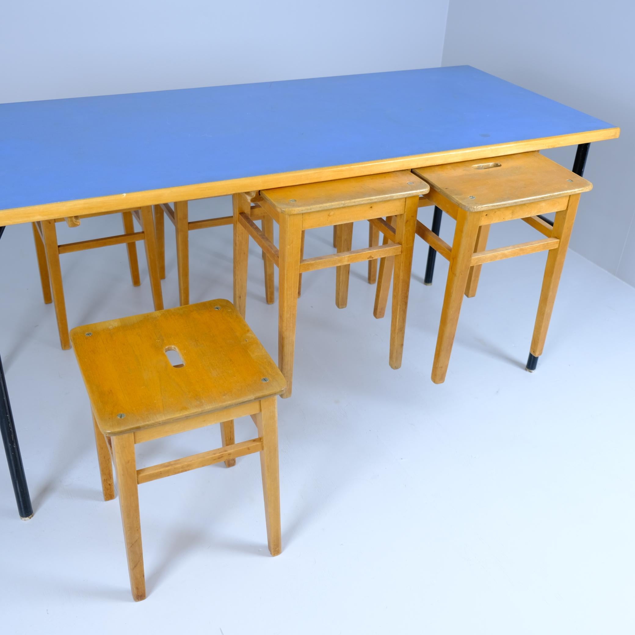 Mid-20th Century Mid-Century Modern Blue Linolium & Black Metal Table & Six Wooden Nesting Stools For Sale