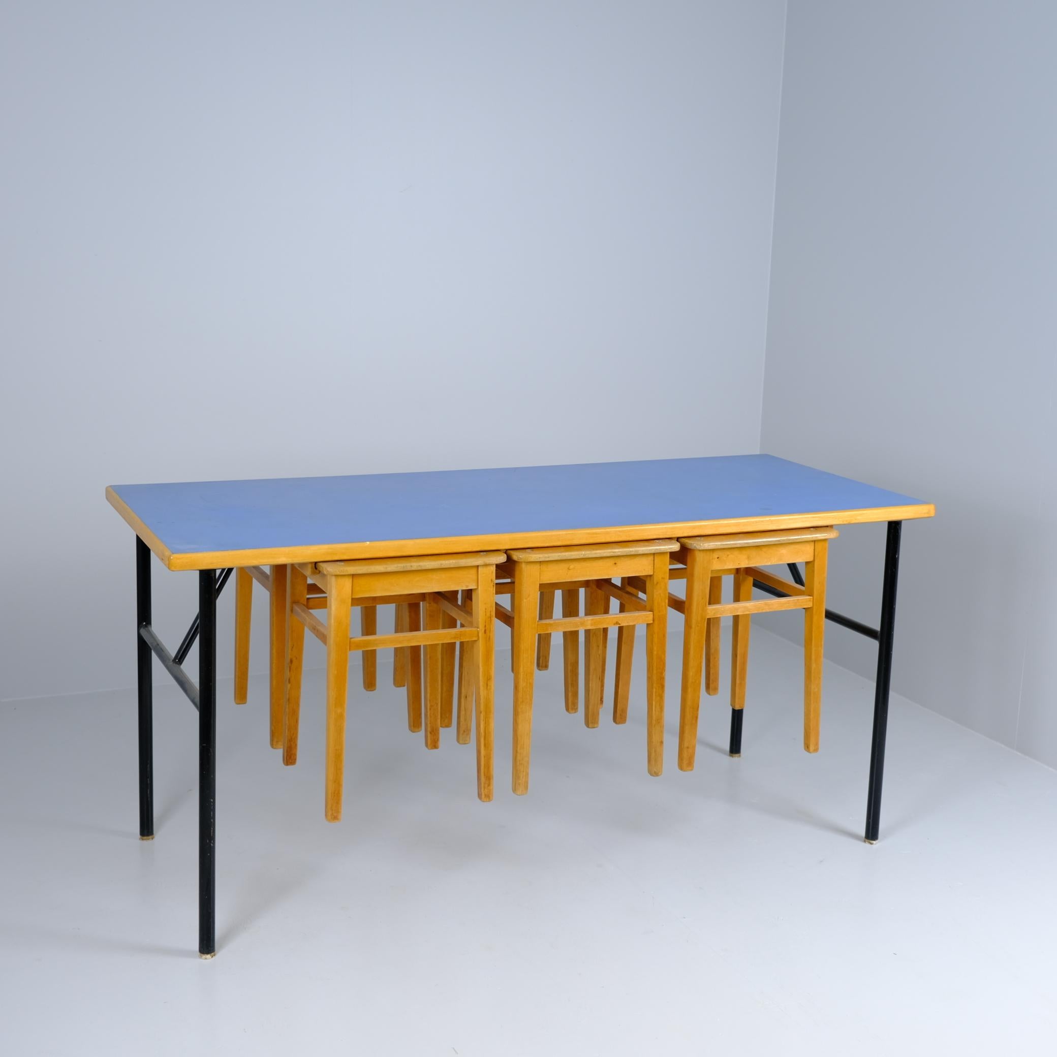 Mid-Century Modern Blue Linolium & Black Metal Table & Six Wooden Nesting Stools For Sale 1