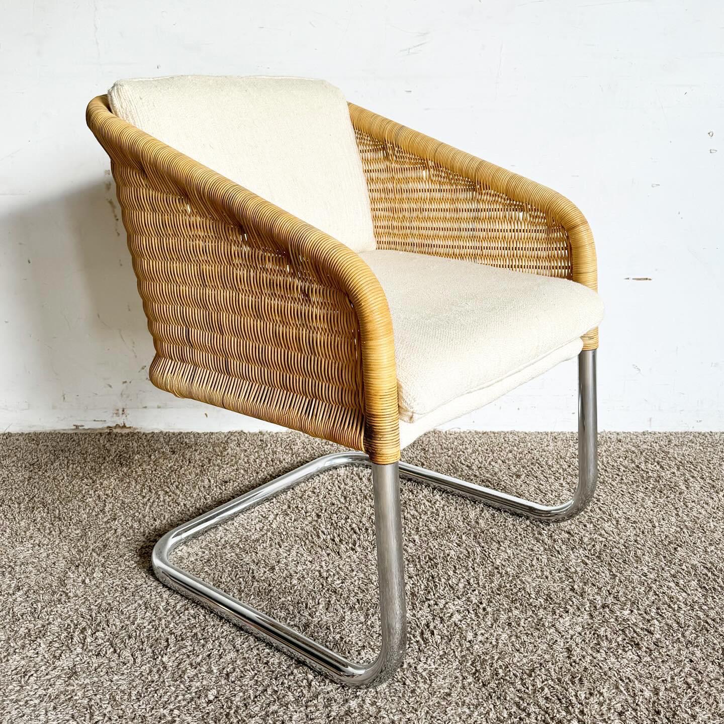 The Mid Century Modern Boho Chrome and Wicker Cantilever Arm Chair is a striking blend of styles. It features a sleek chrome frame and natural wicker seating, offering comfort with a floating cantilever design. This chair combines industrial appeal