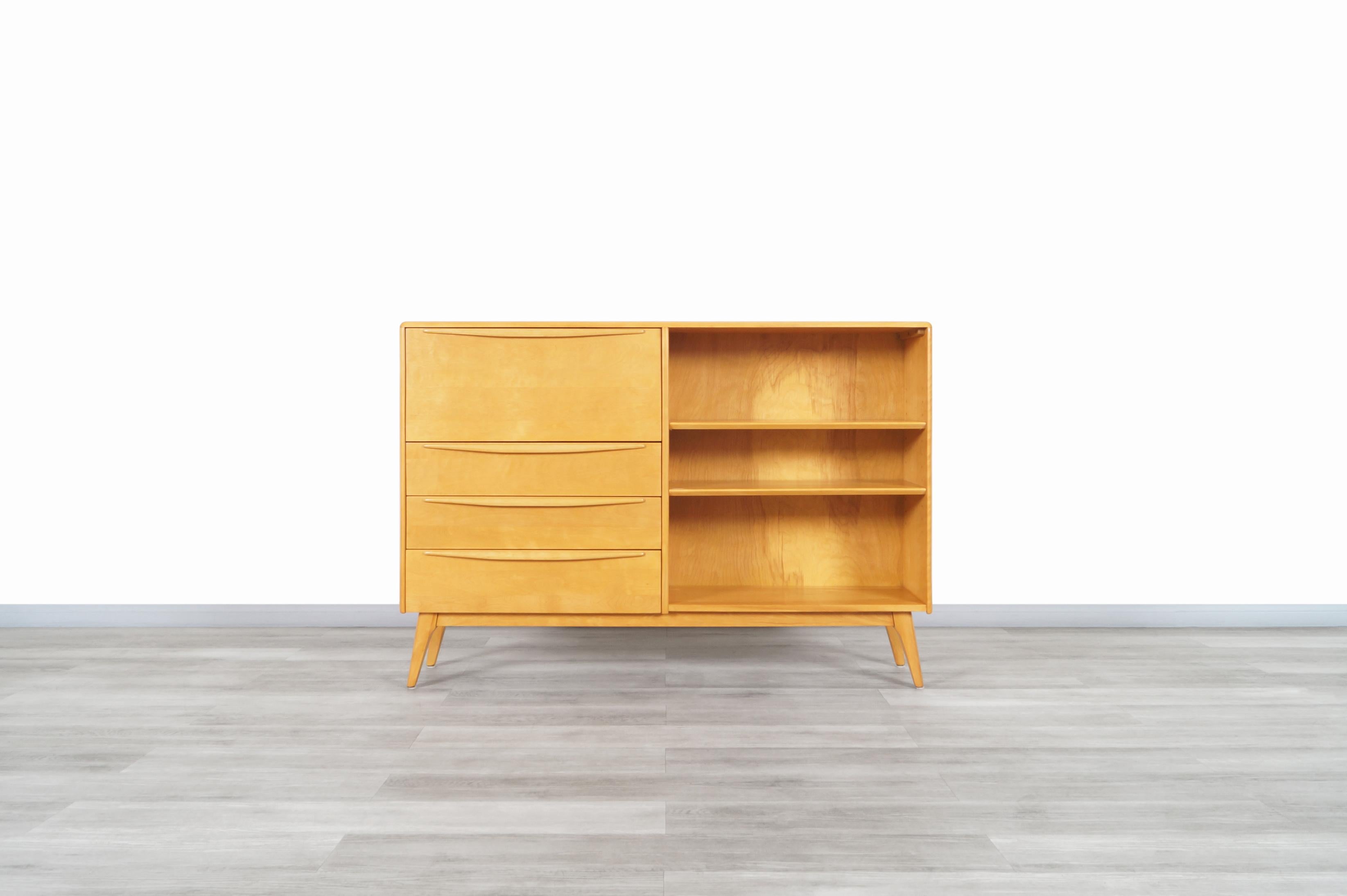 Amazing Mid-Century Modern bookcase with secretary desk manufactured by Heywood Wakefield in the United States, circa 1950s. This bookcase belongs to the 