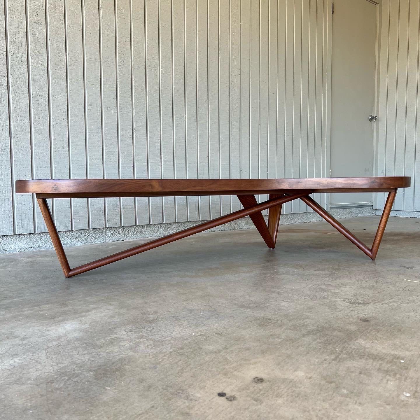 Mid-Century Modern boomerang or kidney-shaped coffee table with sculptural wood legs, 1950s-1960s, unsure of maker, but this table is one that is truly rare. This table was completely brought this table back to life, refinished and added a new