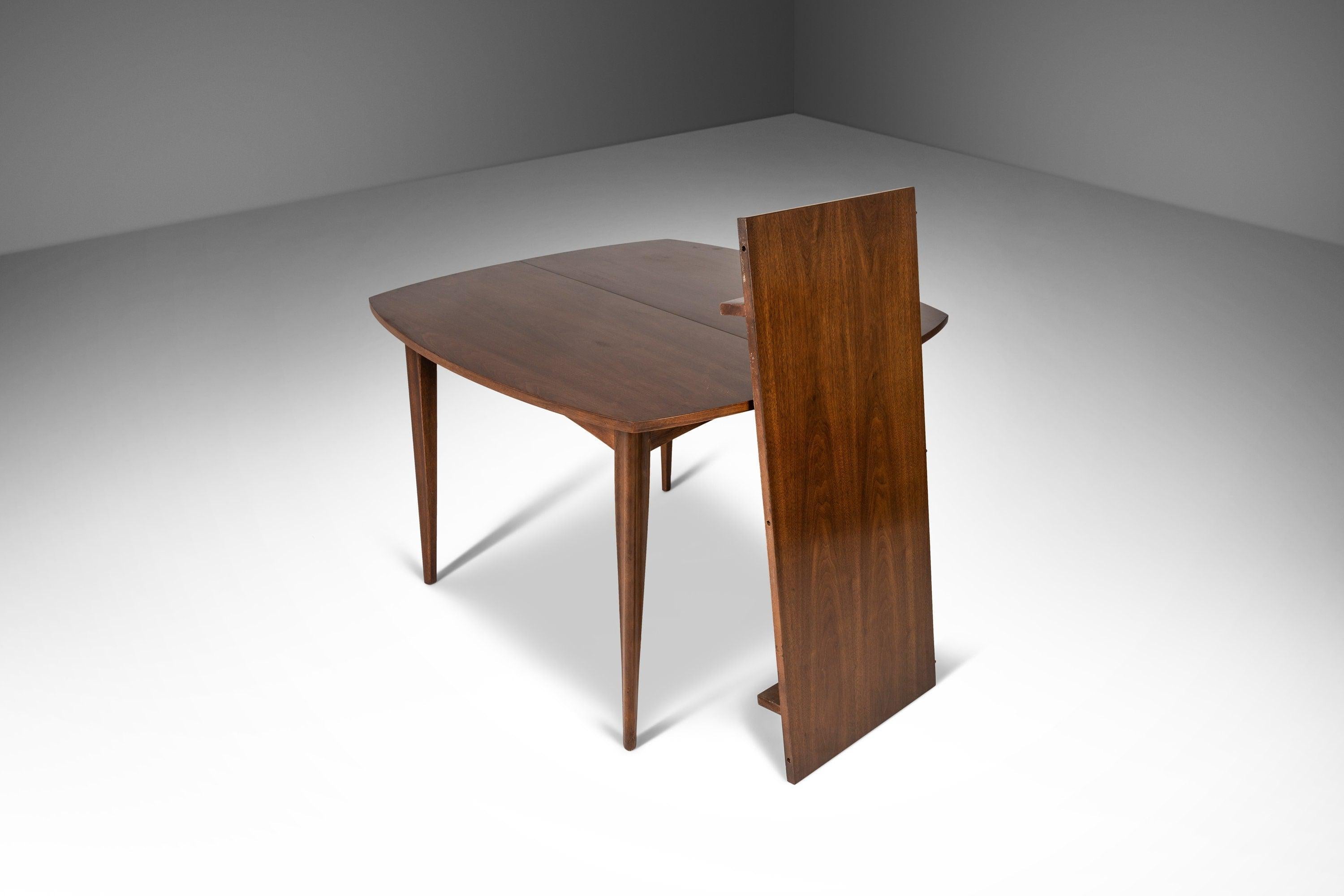 Attention collectors! This iconic Brasilia extension dining table is in 100% original vintage condition and has aged to perfection. Designed and produced in the early 60's the Brasilia line takes inspiration from the namesake capital of Brazil