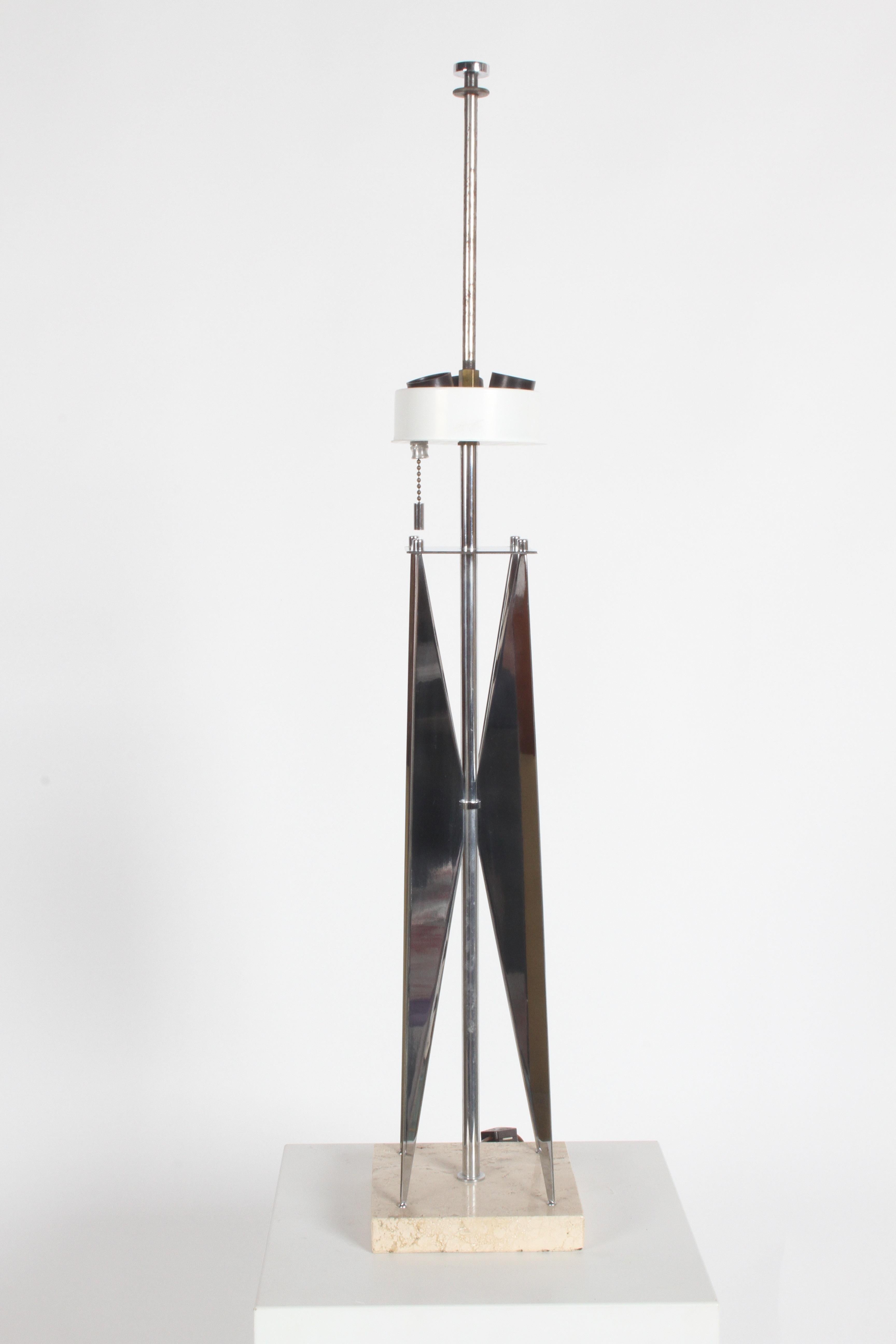 Great clean lines, sculptural and very architectural, circa 1960s Oscar Niemeyer Brasilia influenced table lamp. Chrome architectural fins on travertine base, three-light sockets, chain, plus inline switch. Sold with original shade, that does show