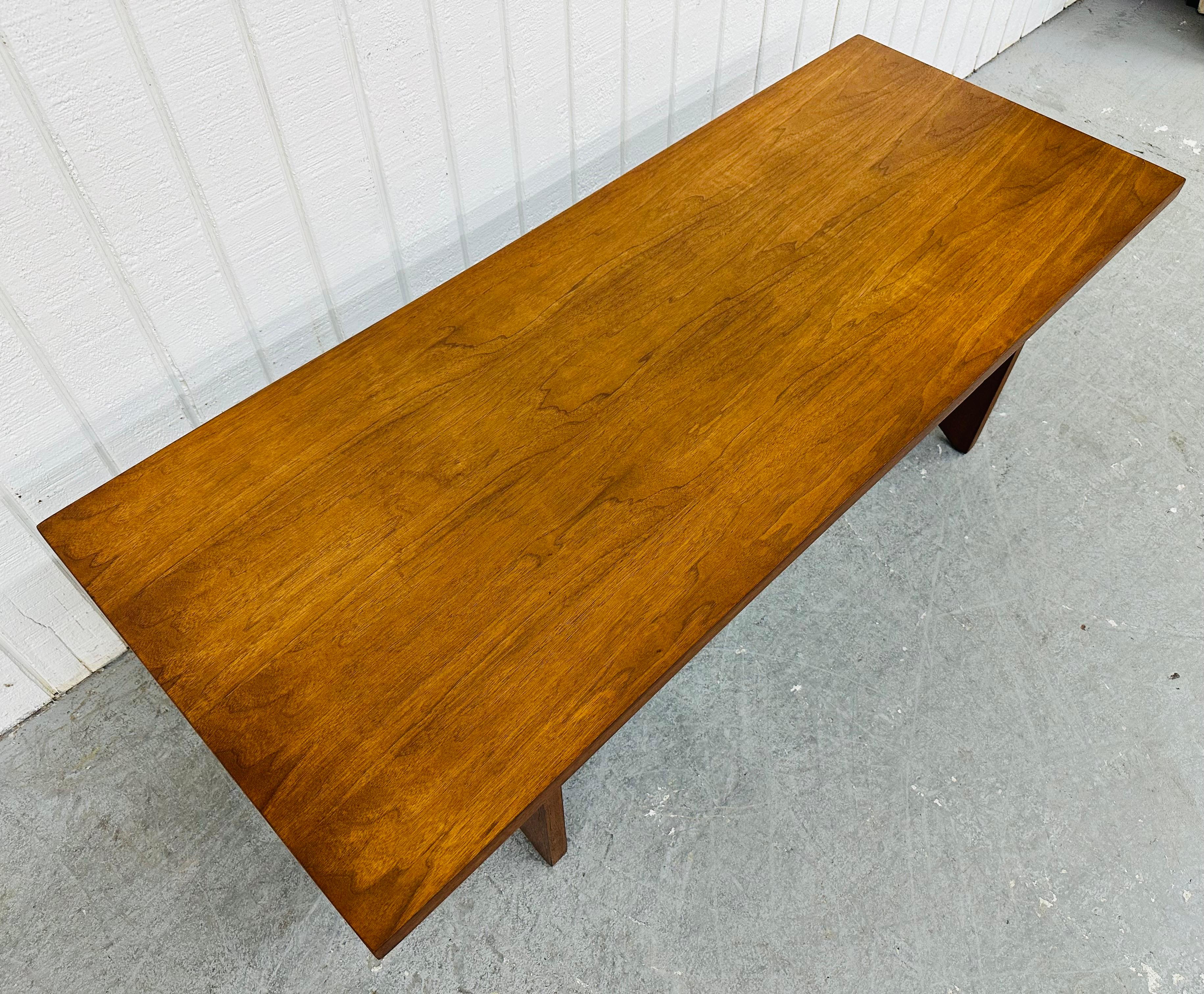 This listing is for a Mid-Century Modern Brasilia Style Walnut Coffee Table. Featuring a straight line design, rectangular walnut top, sculpted Brasilia style legs, and a beautiful walnut finish. This is an exceptional combination of quality and