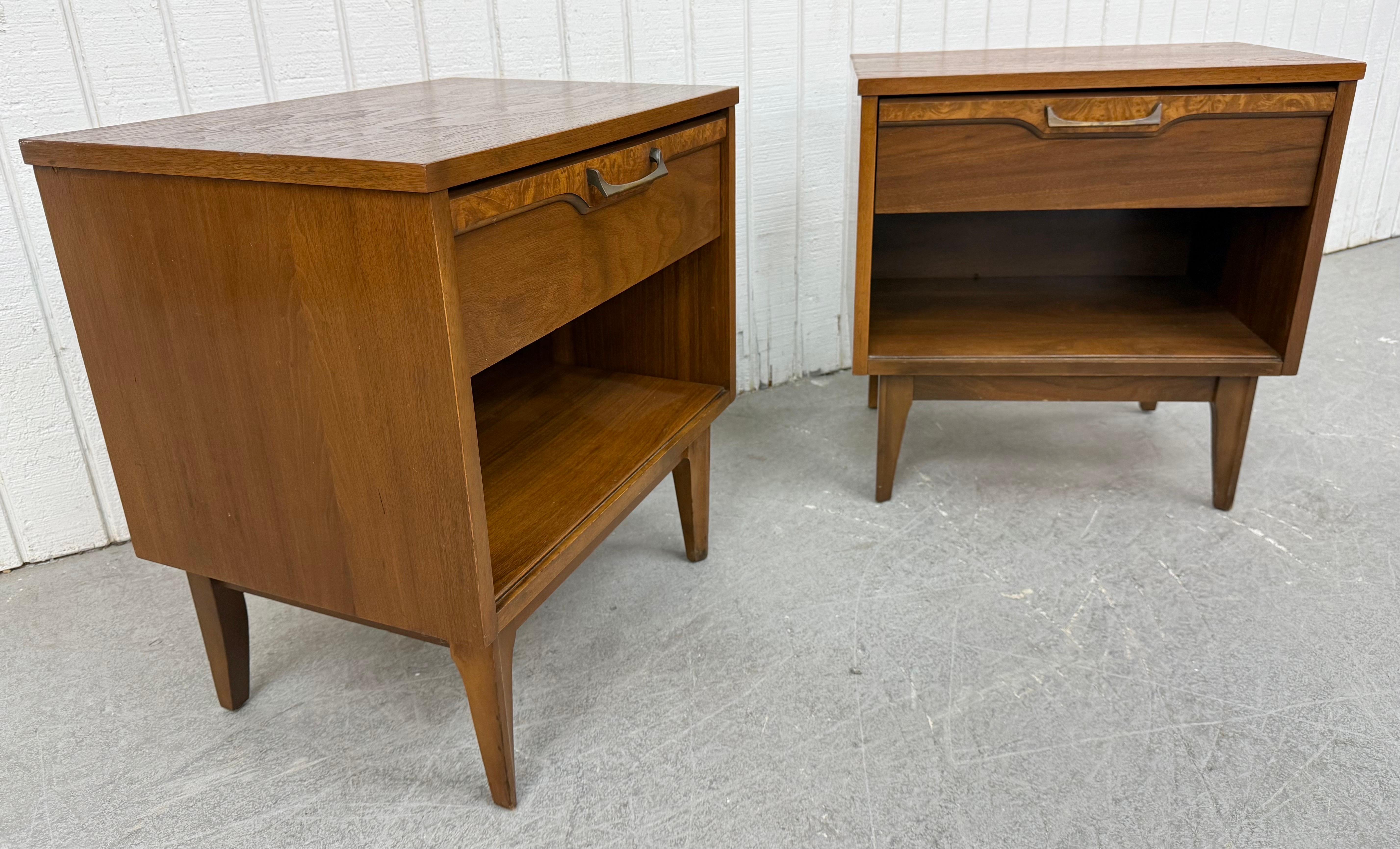 This listing is for a pair of Mid-Century Modern Brasilia Style Walnut Nightstands. Featuring a straight line design, single drawer with brass hardware, open bottom for storage, modern legs, and a beautiful walnut finish. This is an exceptional