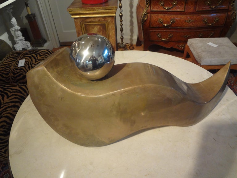 Mid-Century Modern brass and chrome abstract sculpture. This stunning large abstract sculpture would look great on a pedestal, cocktail table or console table.
Great patina!