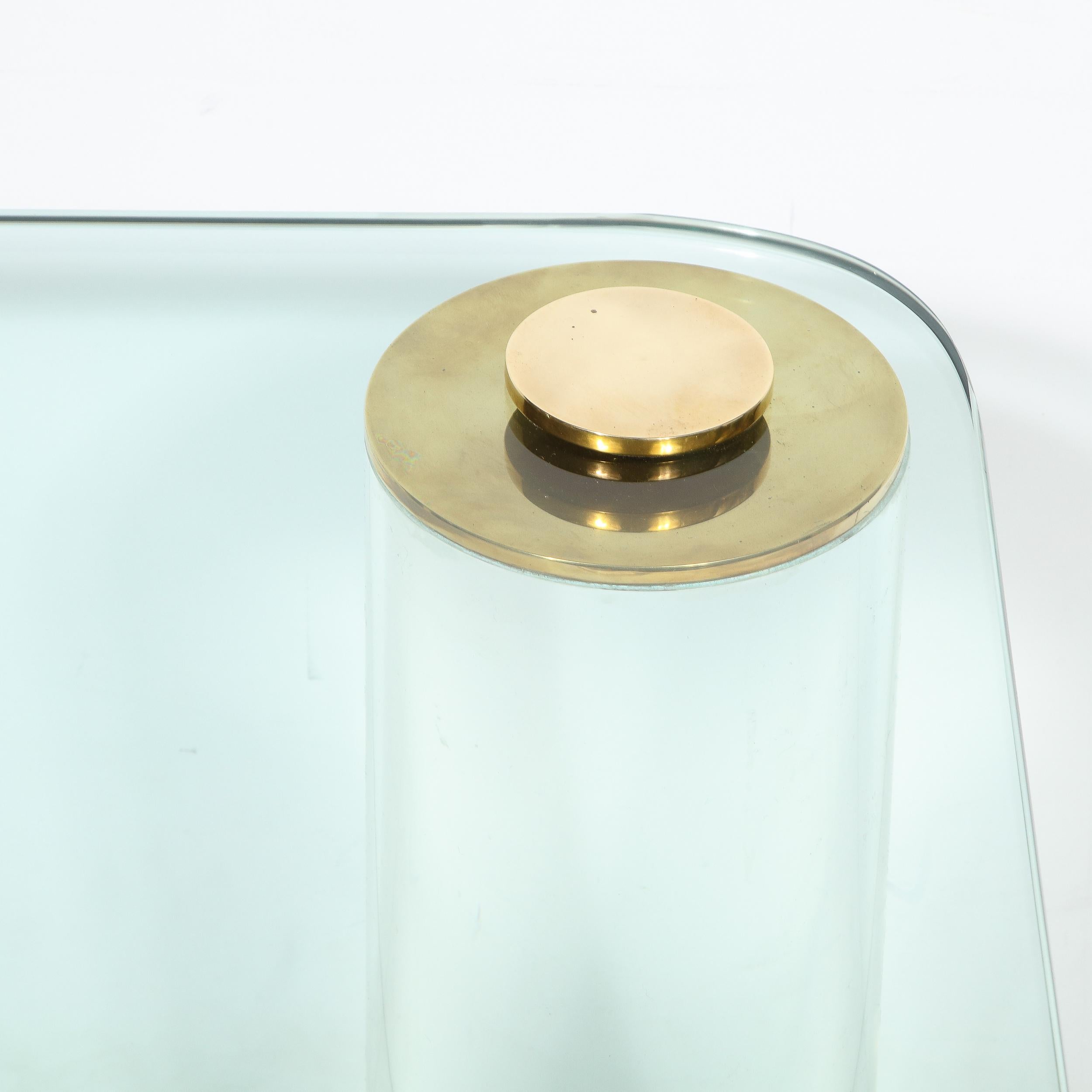 North American Mid-Century Modern Brass and Glass Cocktail Table with Cylindrical Lucite Legs