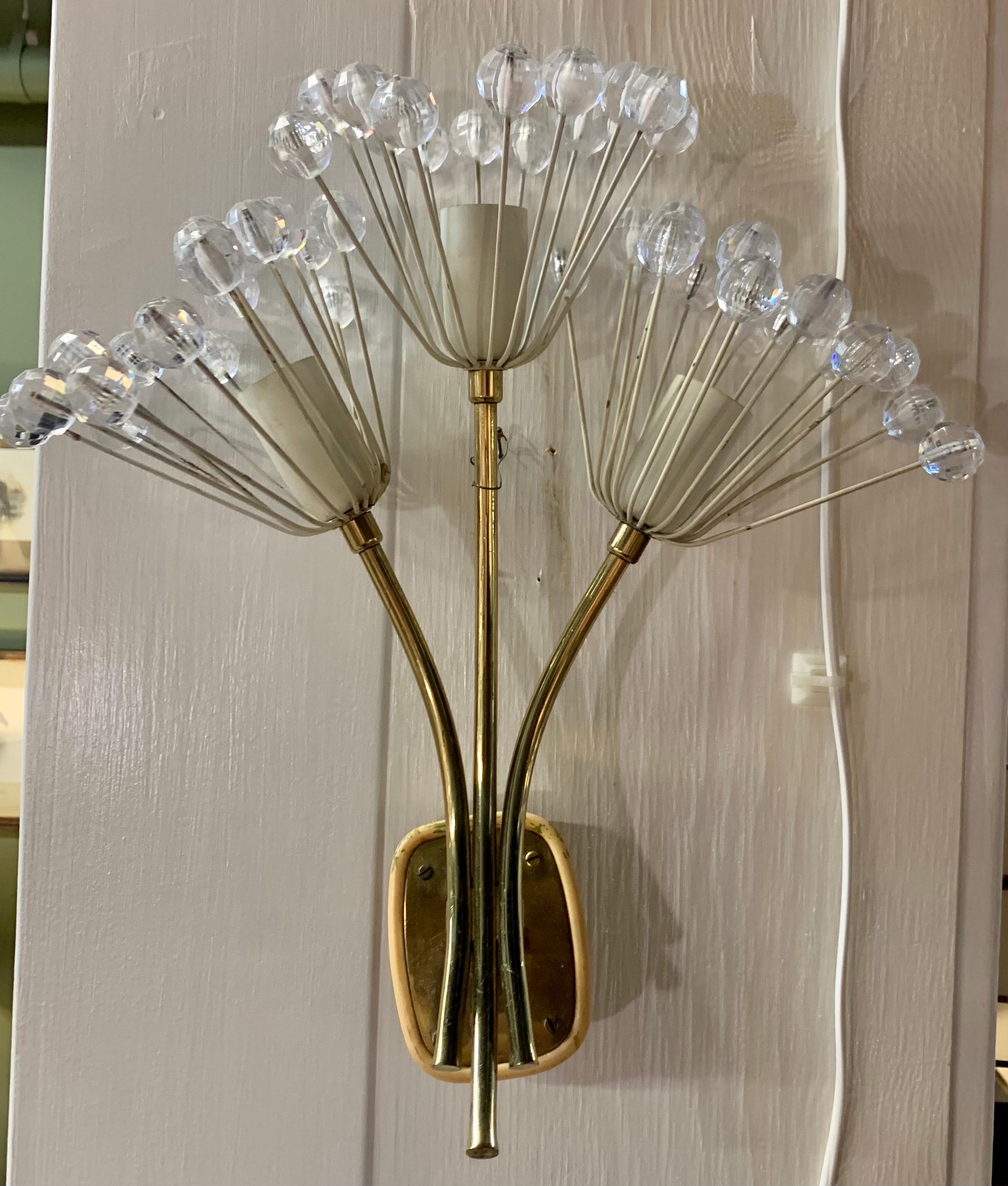 Mid-Century Modern electrified brass and glass floral wall sconce. Wired for USA and in perfect working order. Now, more than ever, home is where the heart is.