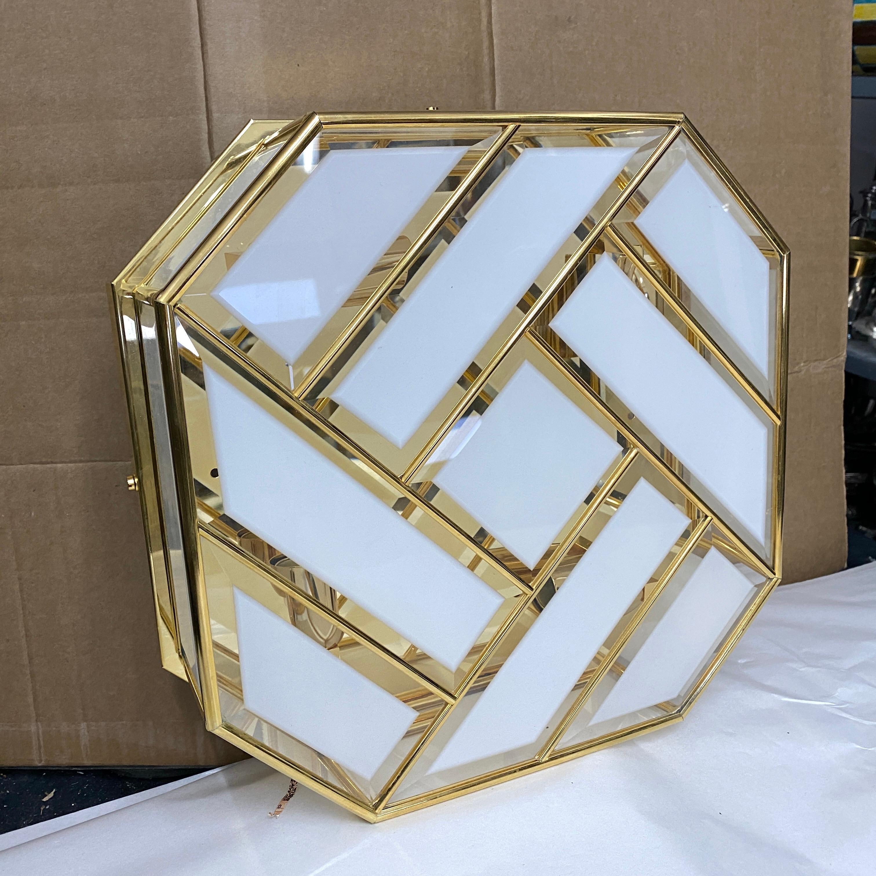 A vintage ceiling light made in Italy in the 1970s, it hasn't been never used, it comes from a closed lighting store. It's in perfect conditions.