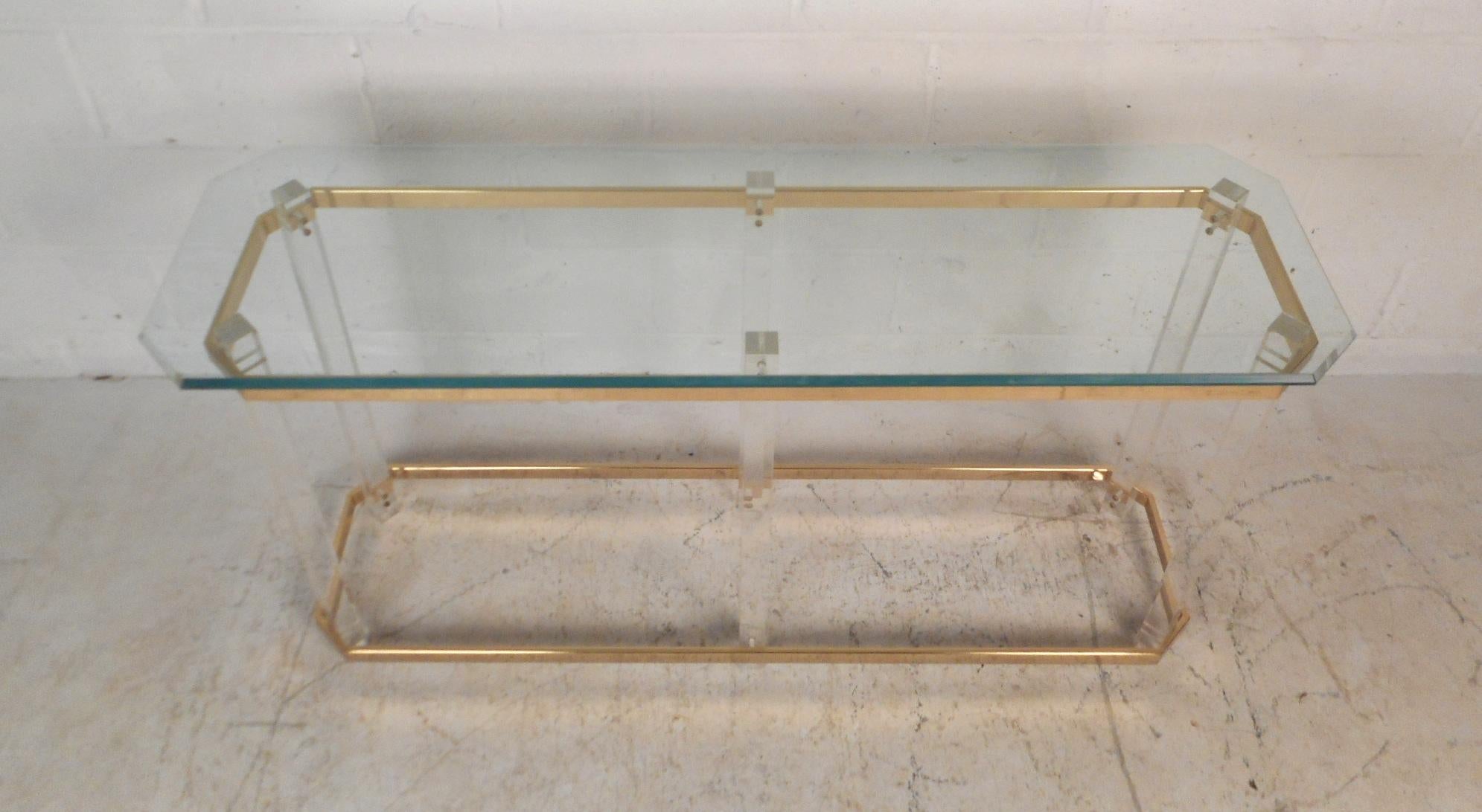 lucite and brass console table