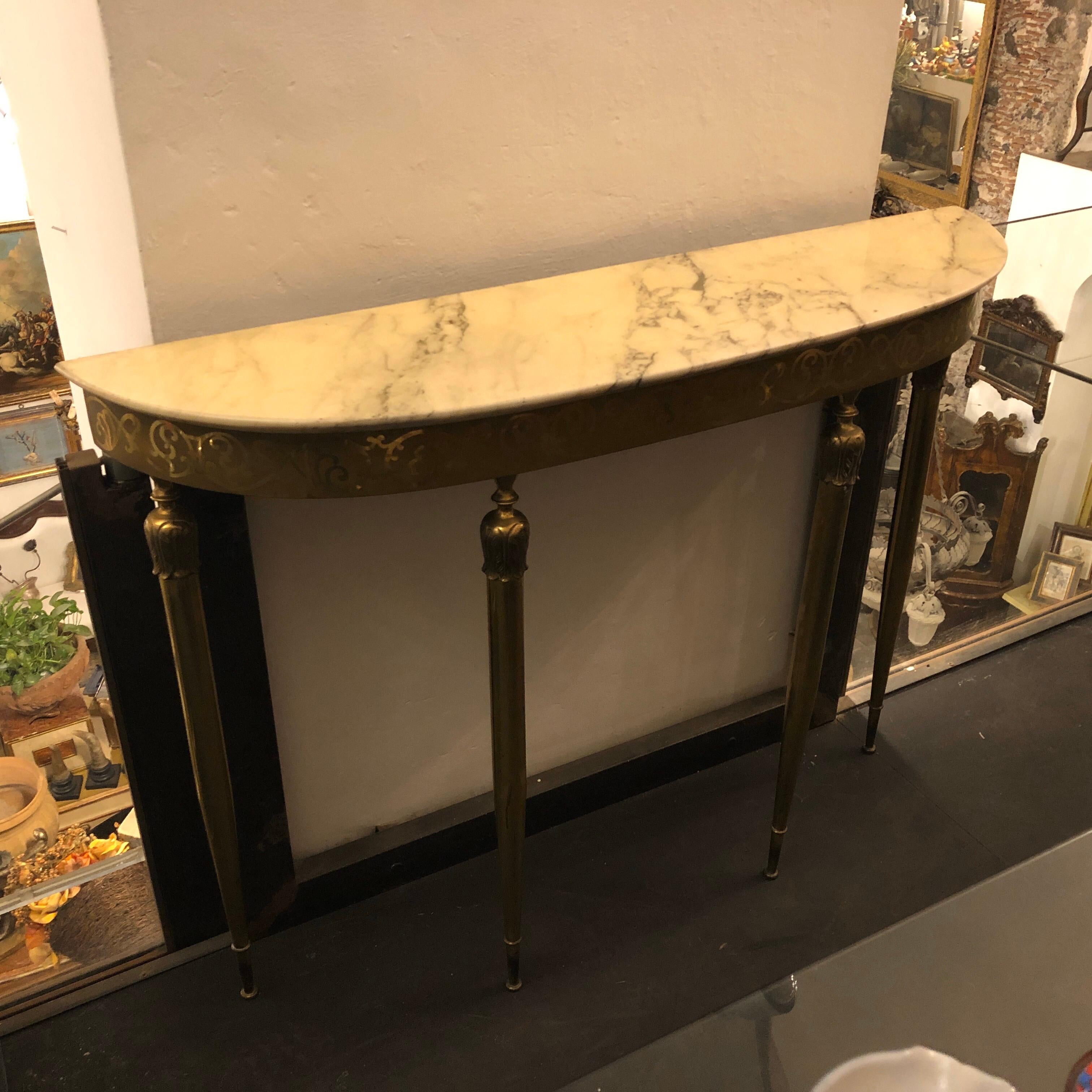 Mid-Century Modern Italian console in the style of Paolo Buffa. Brass it's in original patina and it's in perfect conditions.