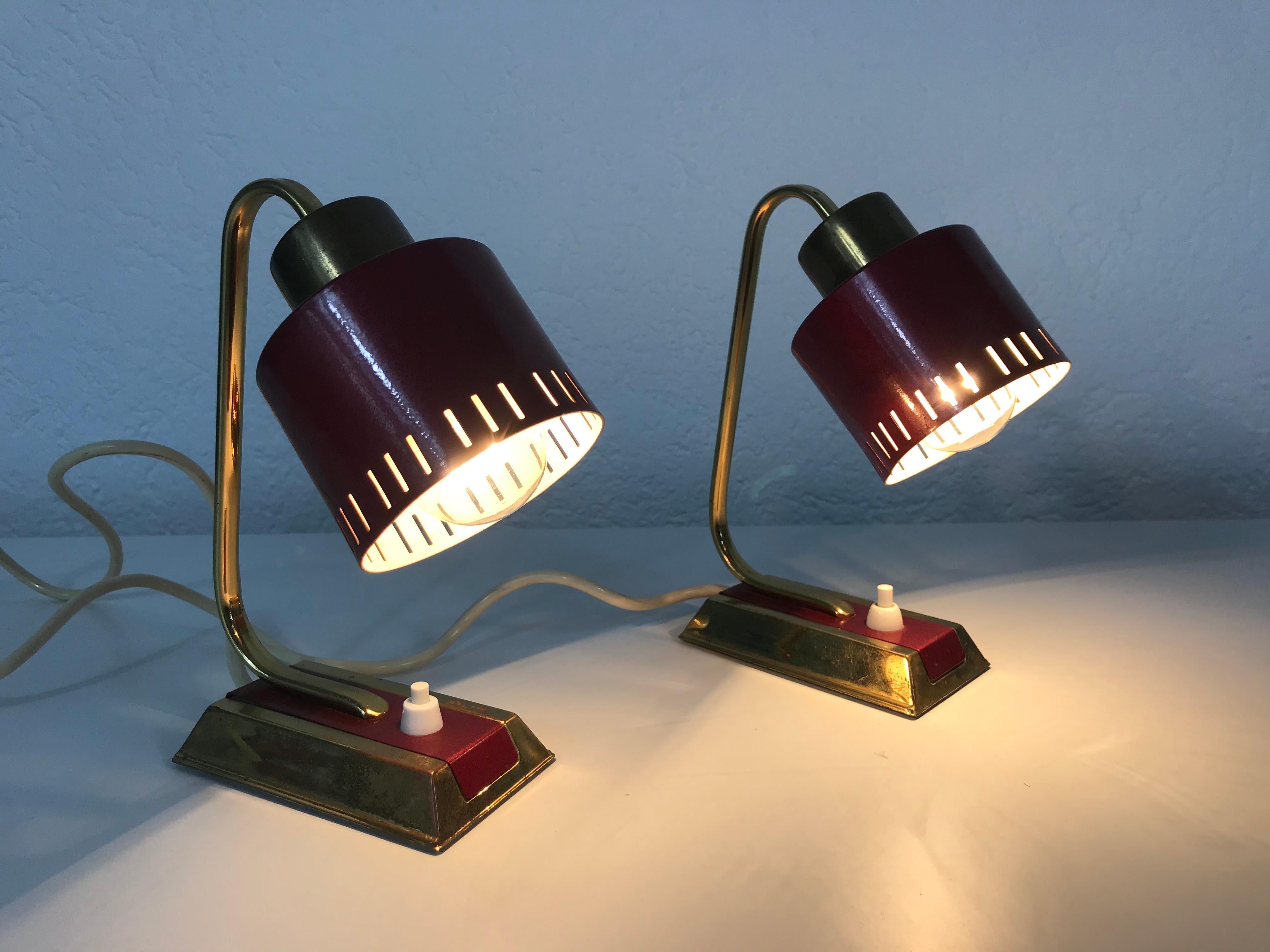 A beautiful pair of midcentury table lamps made in Germany in the 1960s. It is fascinating with its beautiful color. The bar and the on-off bottom are made of polished brass.
Measurements:

Height 20 cm

Width 9 cm

Depth 15 cm

The light