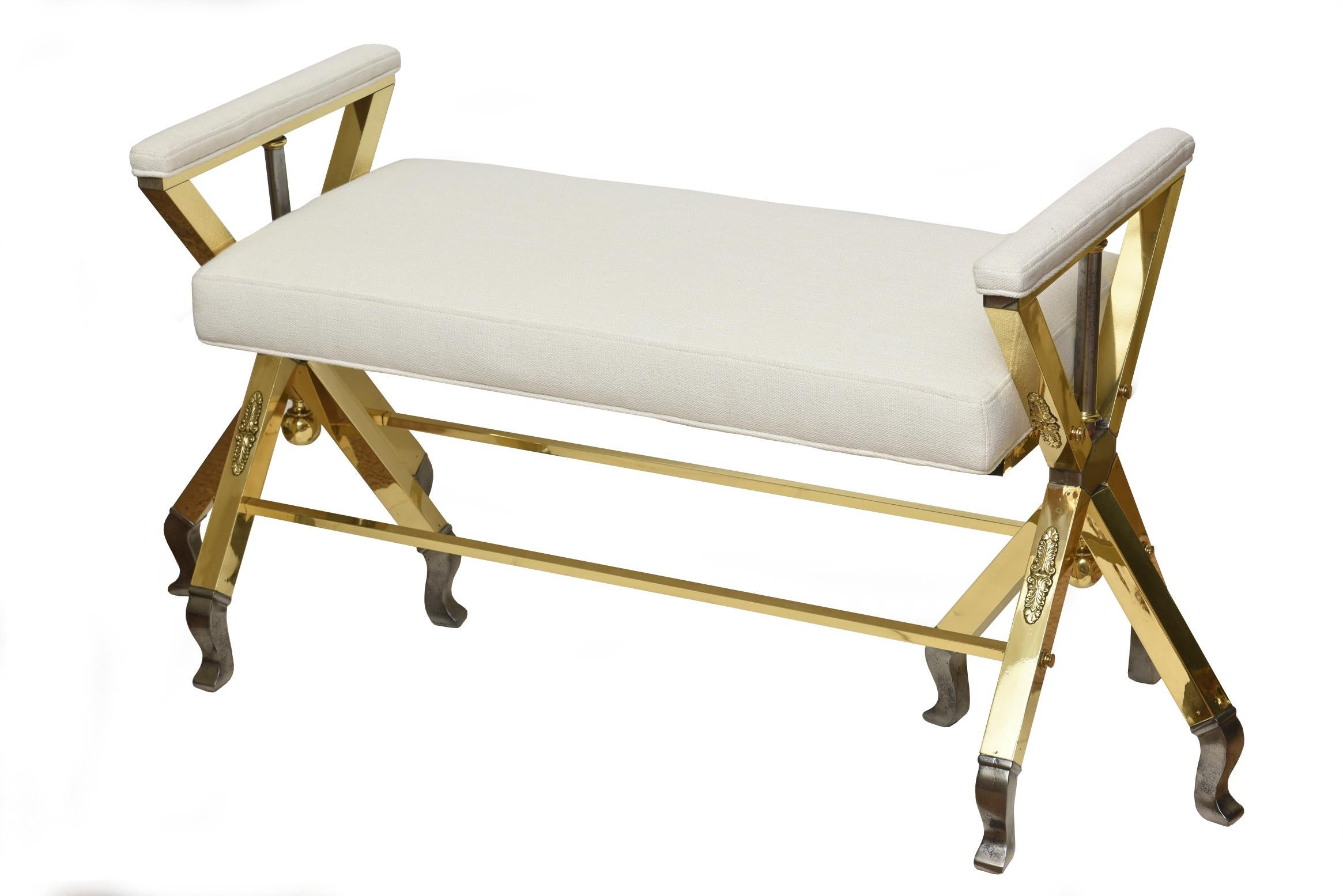 This most unusual and interesting fully restored Mid-Century Modern comfortable 3-legged bench is a combination of polished brass and steel with side arms that are upholstered. The legs can swivel and move around but this is the sturdy composition