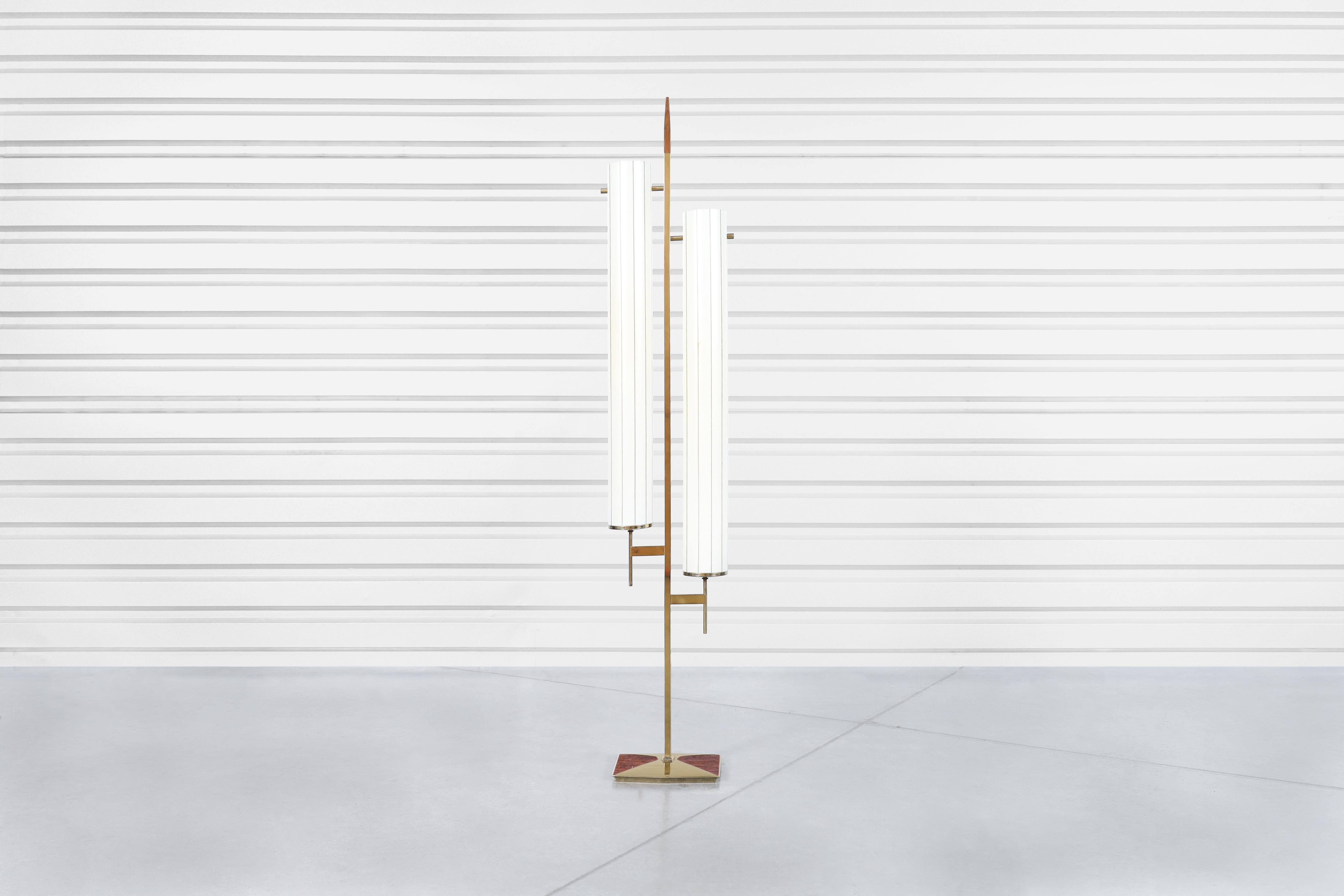 A stunning vintage brass floor lamp, a true gem from the 1970s, reminiscent of the exquisite craftsmanship found in pieces from Laurel Lamp Co. This striking lamp features an elegant brass-plated frame that exudes a warm, inviting glow—perfect for